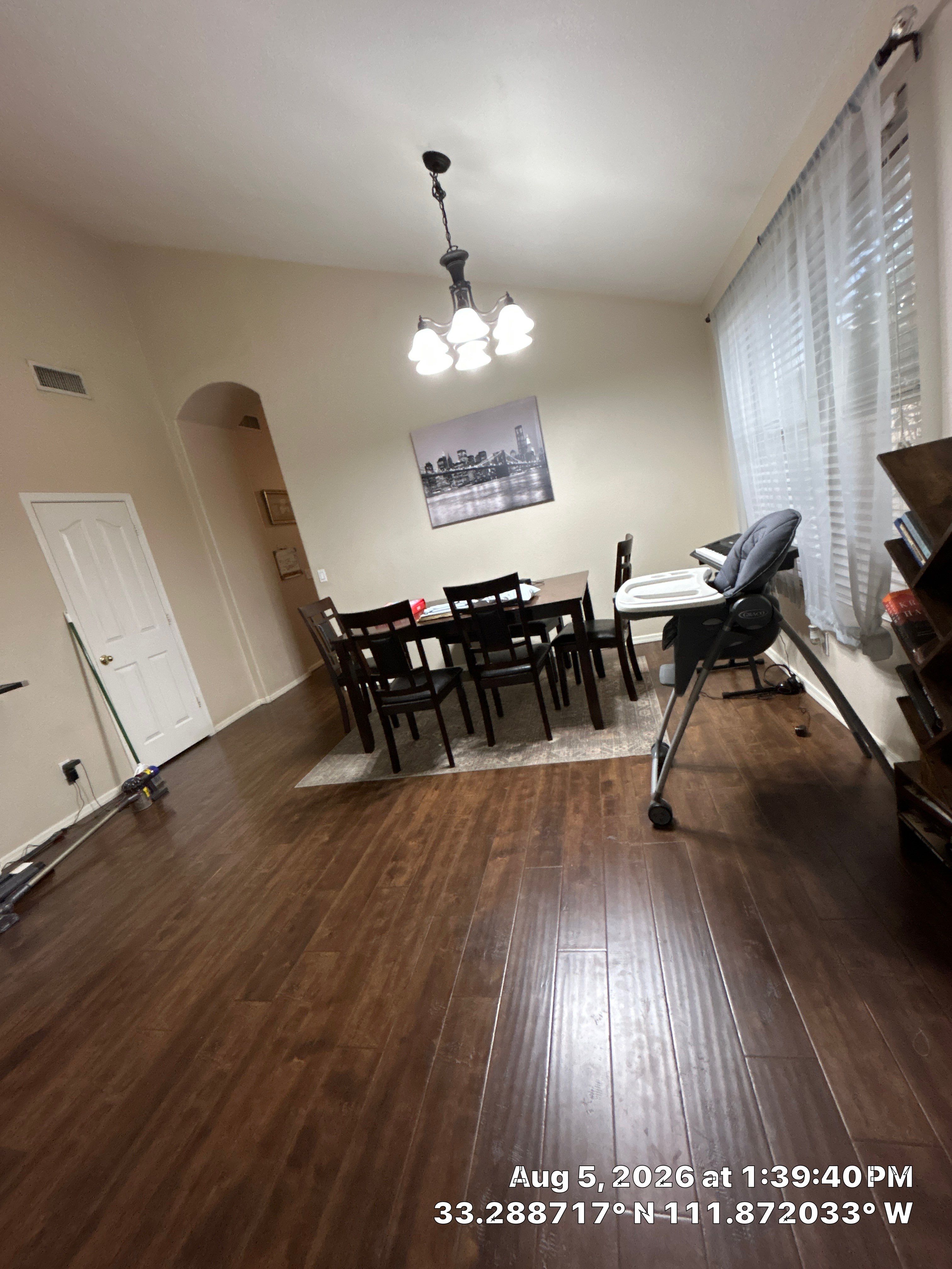 Chandler Dining Room Update with Dark Wood Laminate Flooring by CompanyCam Sales Demo