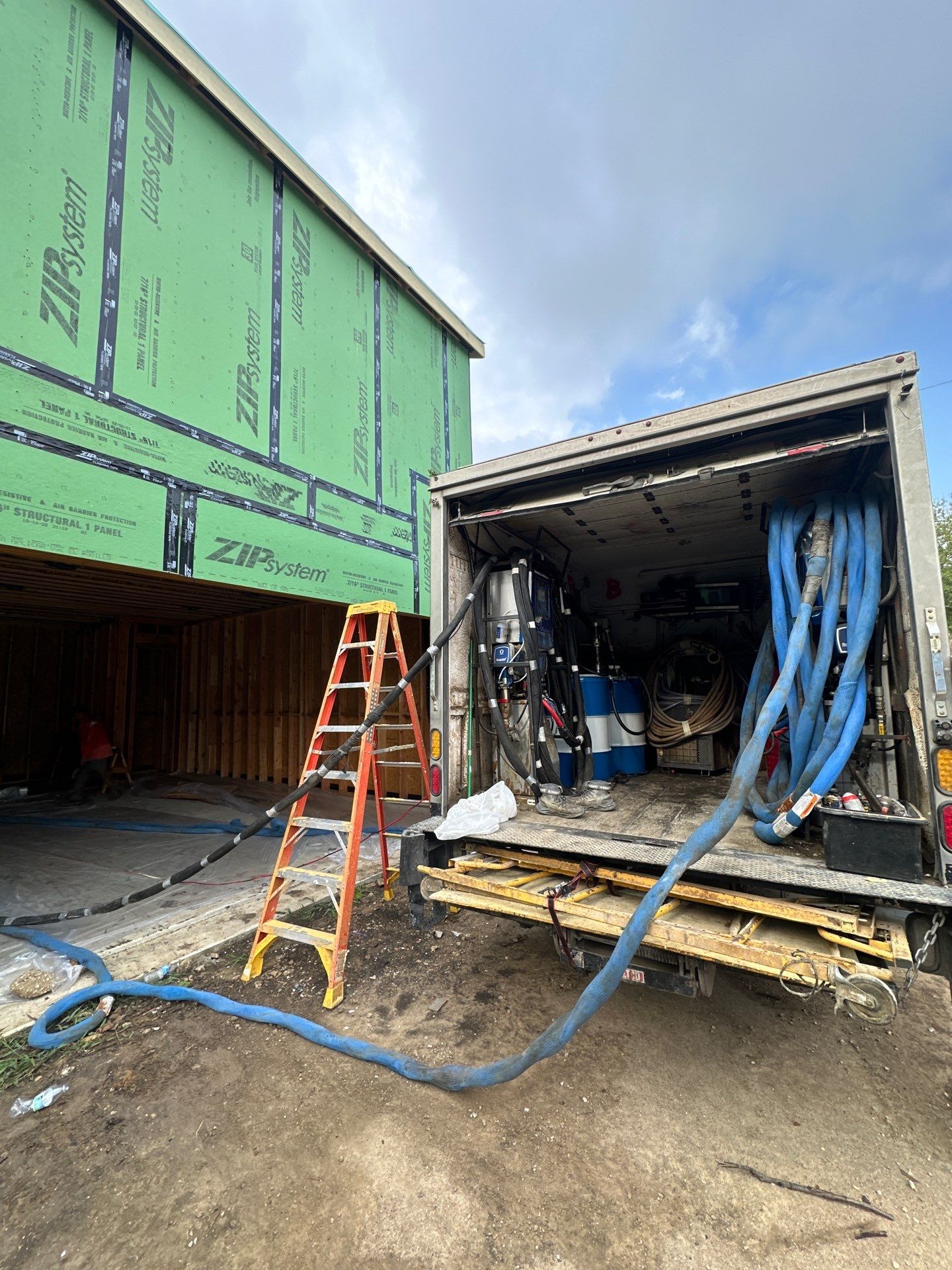 Open cell spray foam job completed at this beautiful custom home in Dallas TX by Apex Insulation Solutions