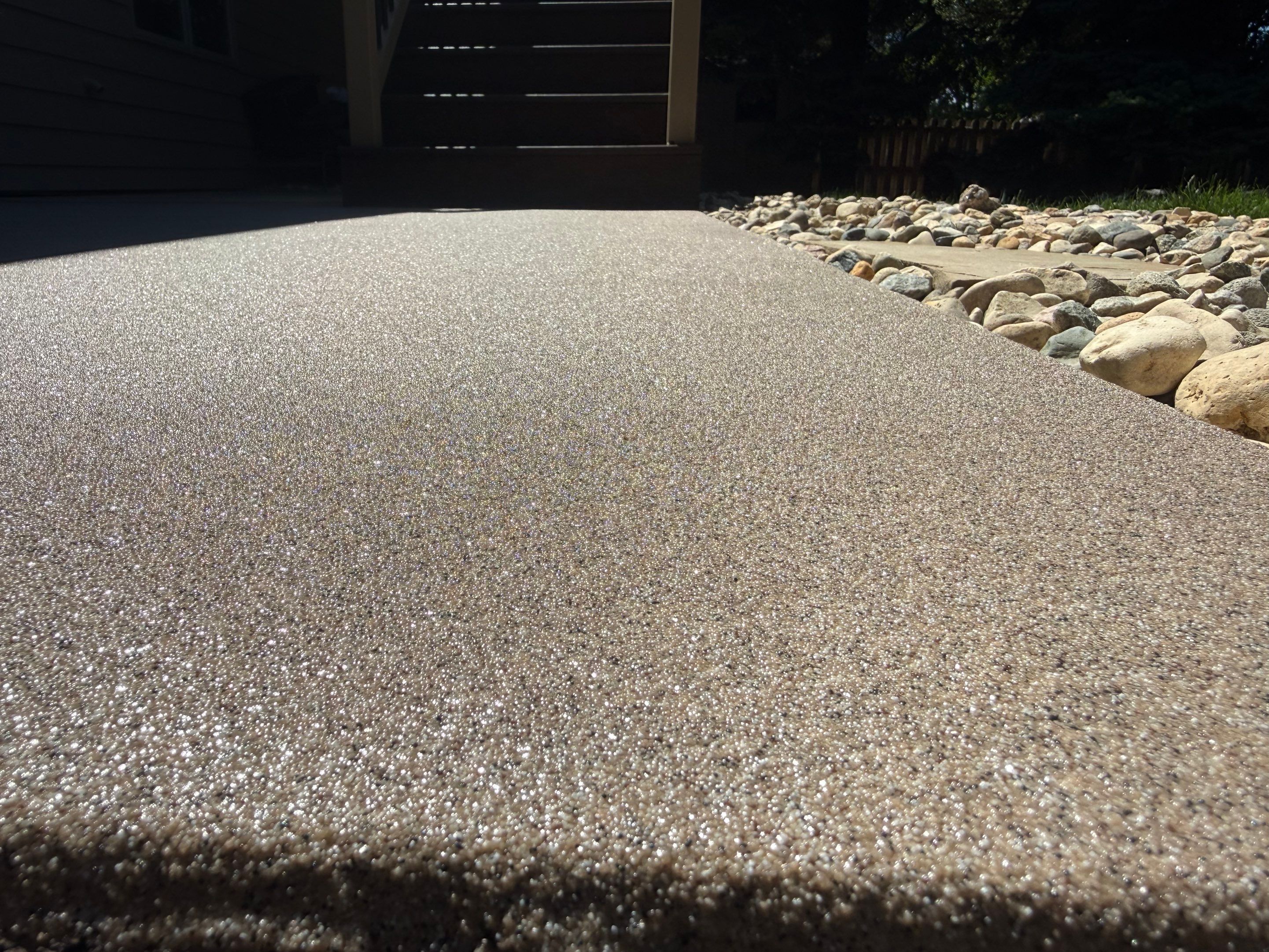 Textured Concrete Coating and Paver Patio Refresh in Sioux Falls by Select Painting, Coatings & Garage Cabinets