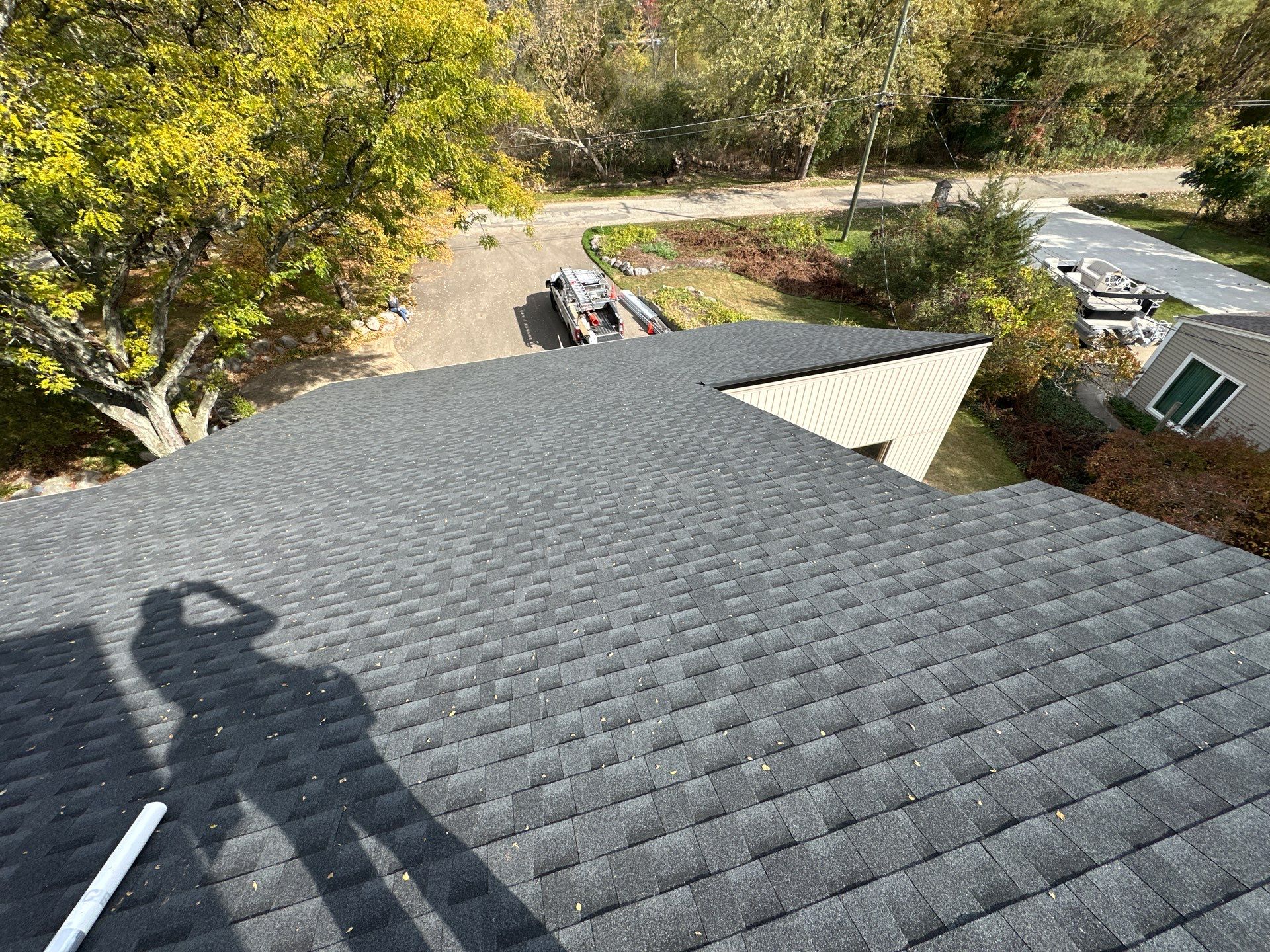 New Shingle Roof with Metal roof accents by Bloomfield Construction & Restoration
