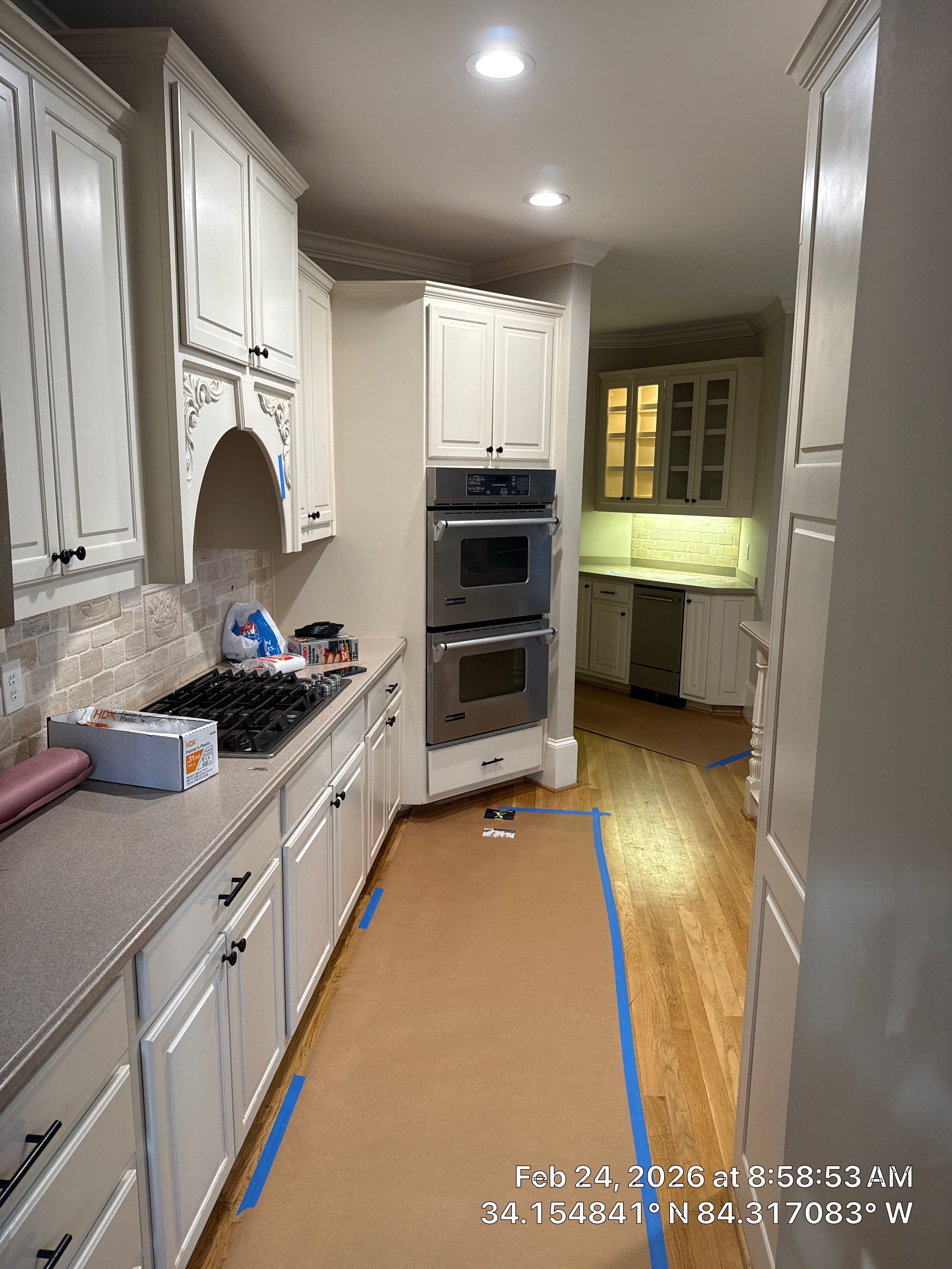 Alpharetta Kitchen Remodel Featuring Double Islands and White Quartz by Heart & Home Kitchen & Bath Remodeling LLC