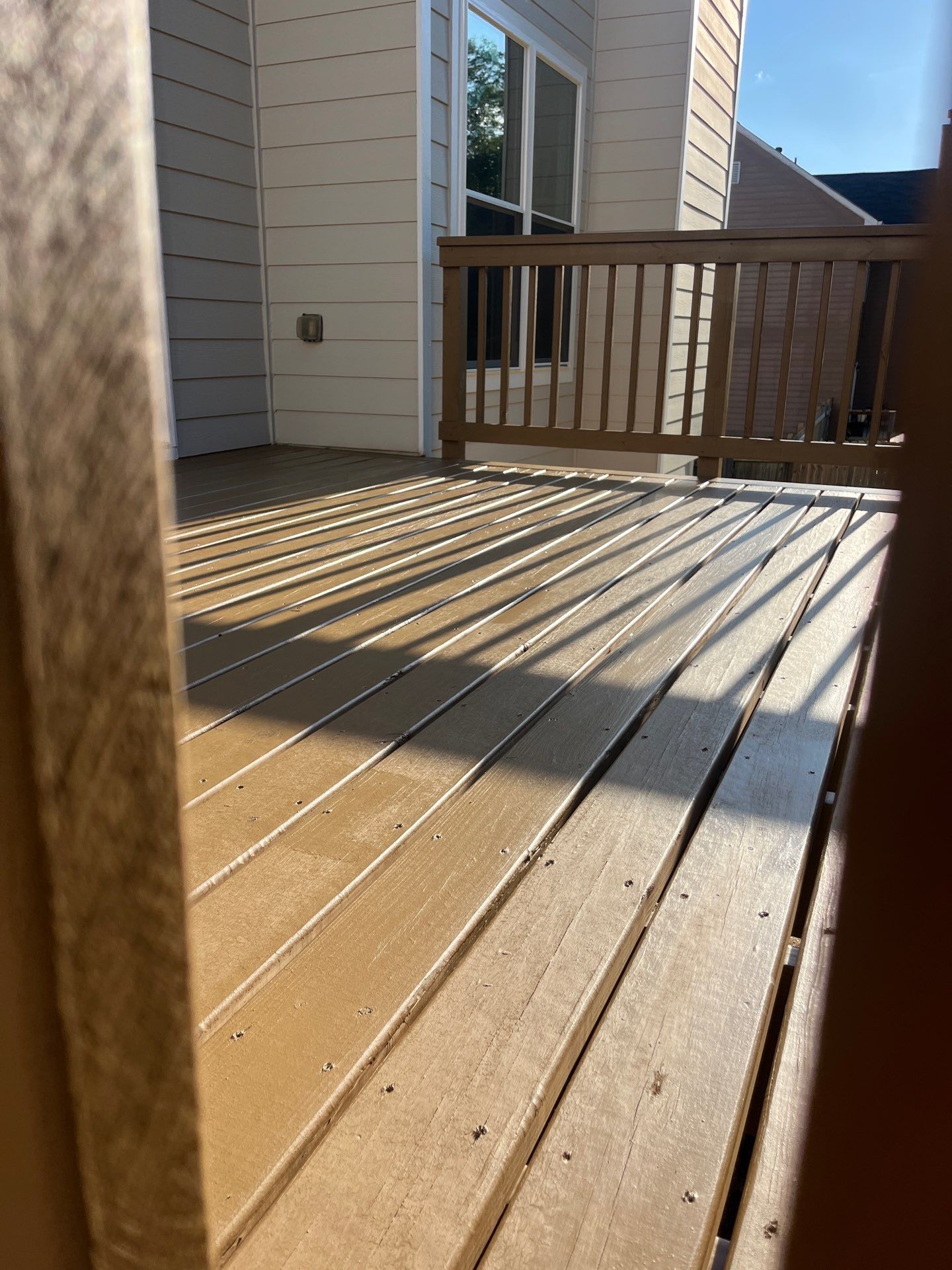 Window & Rotted Wood Replacement, Deck Stain, and Exterior Paint by Nelson Exteriors