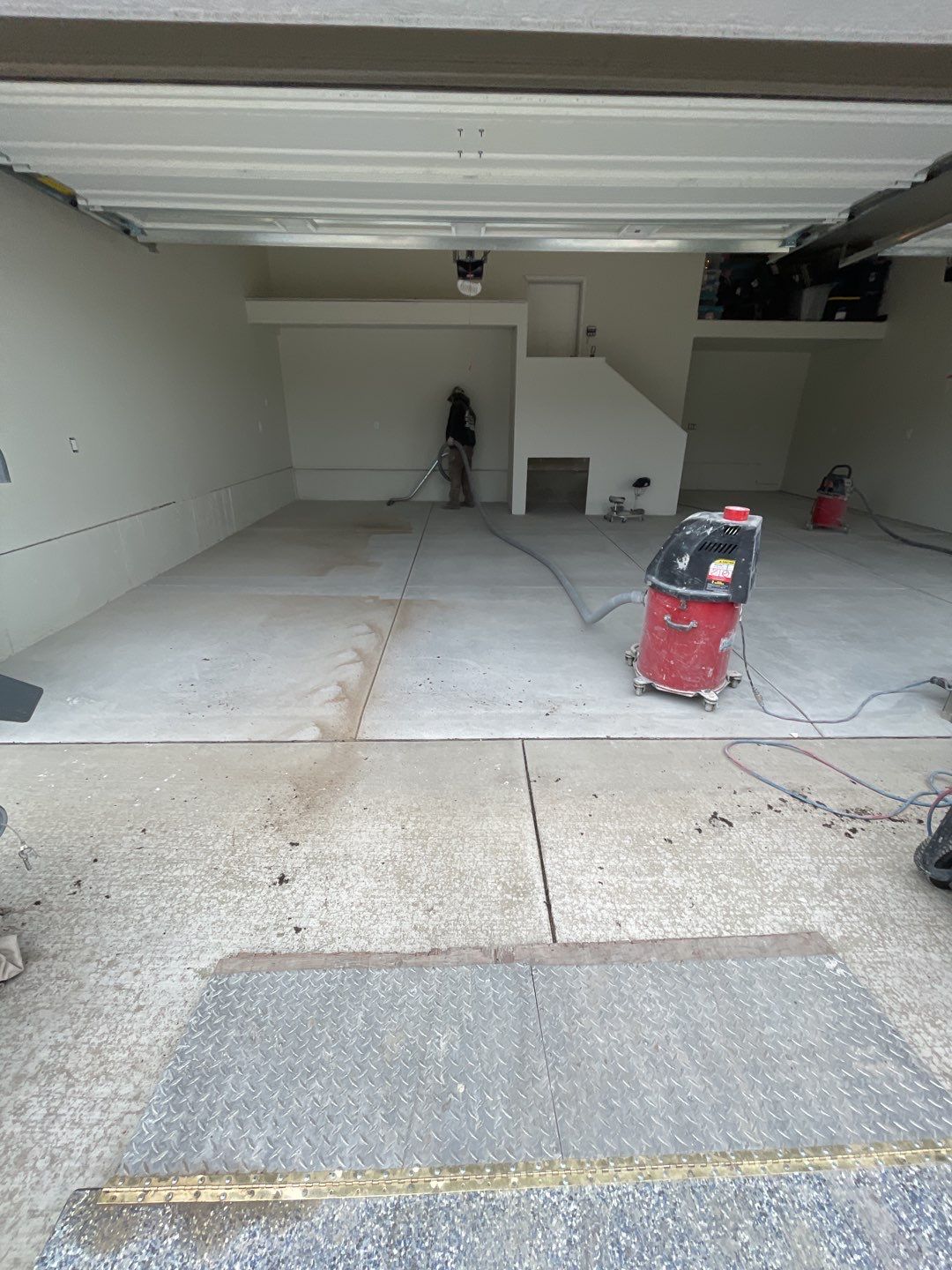 Garage Transformation using Pebble Beach by Croc Coatings, LLC