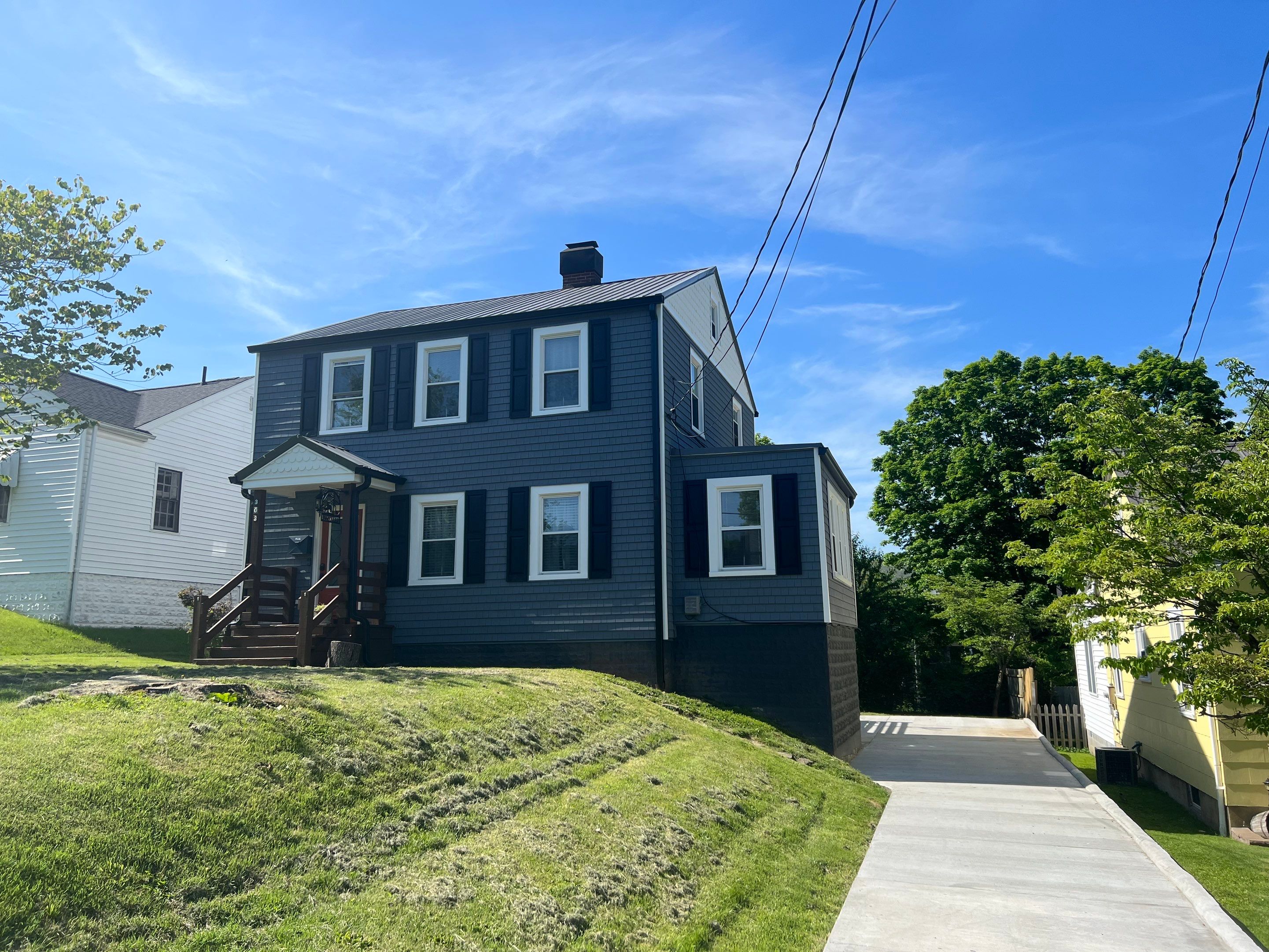 Siding Installation using Exterior Portfolio Portsmouth Vinyl Cedar Shakes by Secure Construction Company Inc