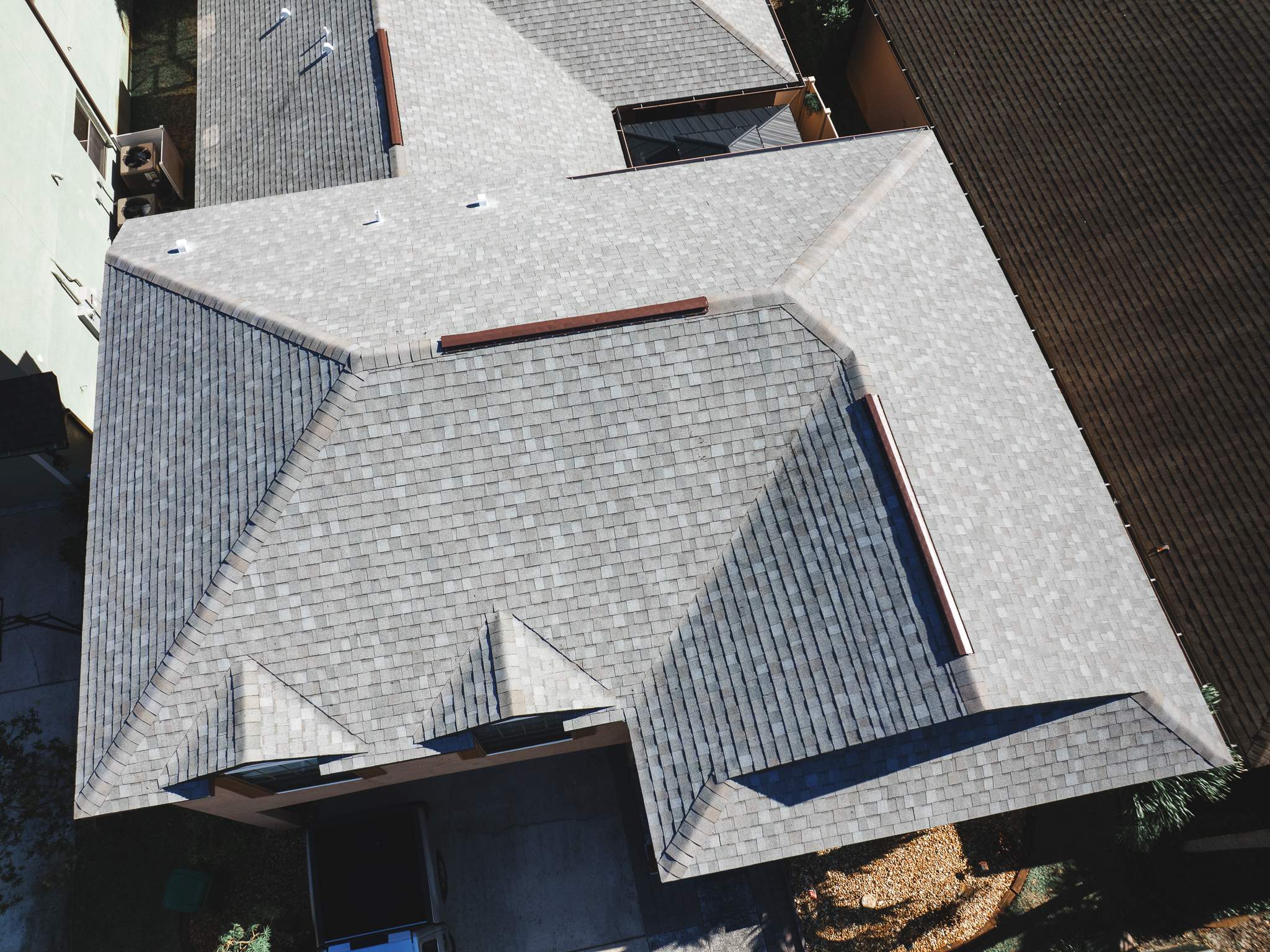 Merritt Island Roof Replacement for Two-Story Home Using Architectural Shingles by Wiedmann Construction & Roofing