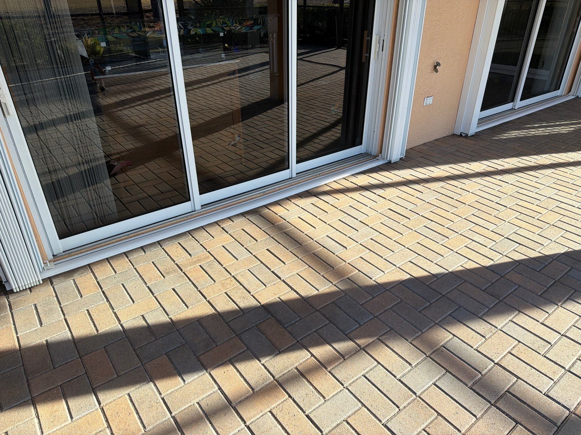 Lanai and Driveway Paver Sealing Project in Sun City Center by Supreme Paver Experts