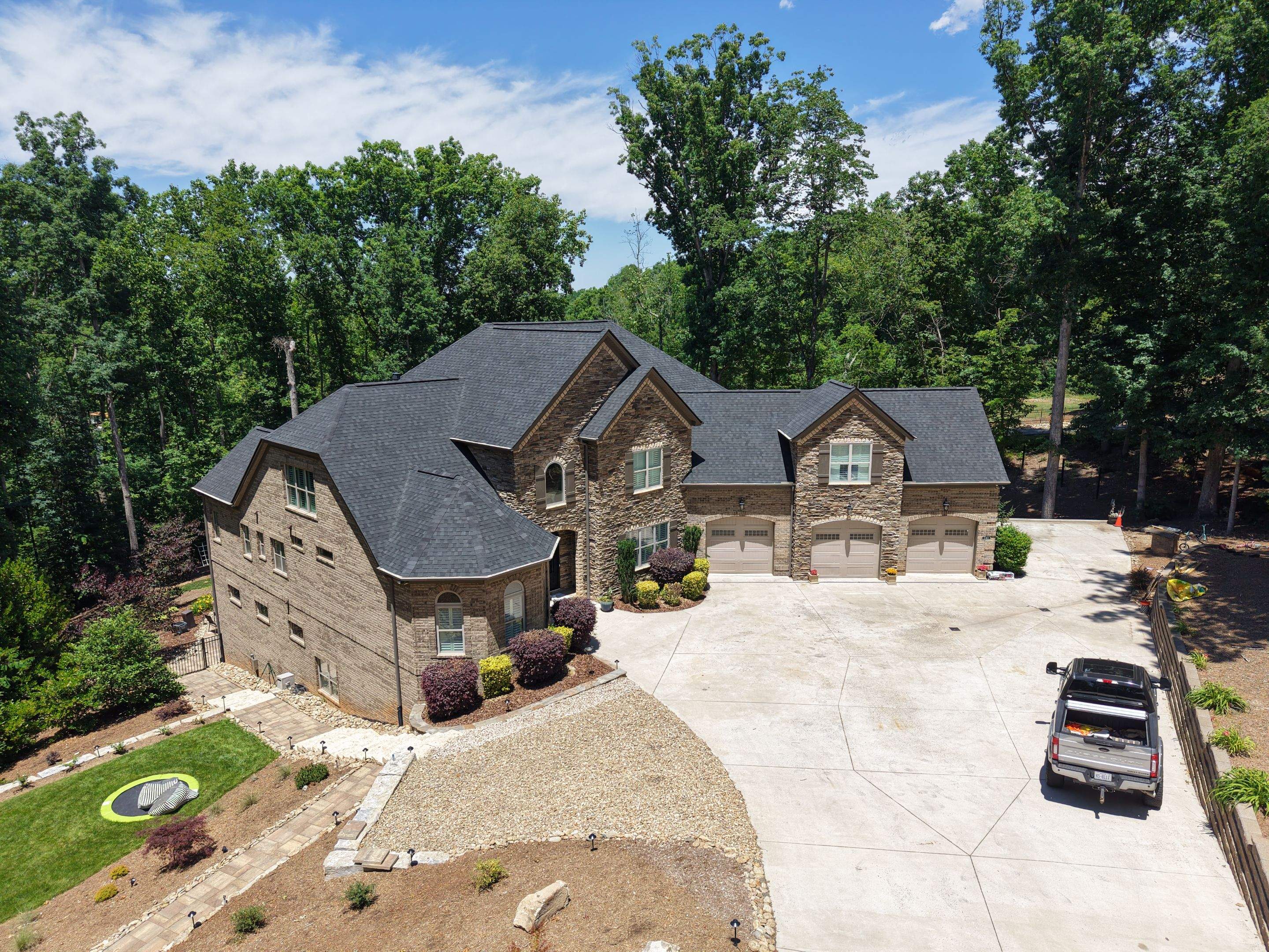Residential Roofing Installation using TAMKO Titan XT Rustic Black by RISE Roofing & Restoration, LLC