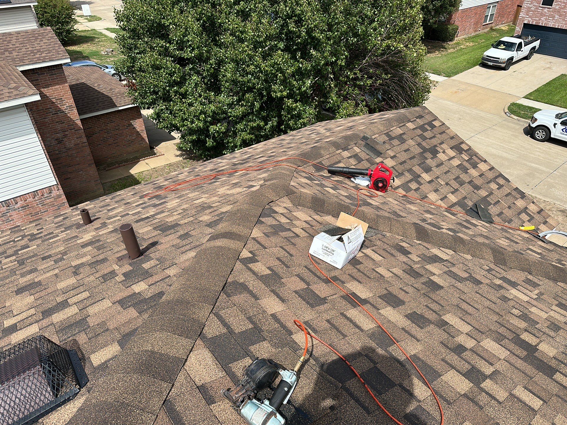 Full Roof Replacement, Chimney Rebuild and Interior Damage Replacement by First United Roofing & Construction