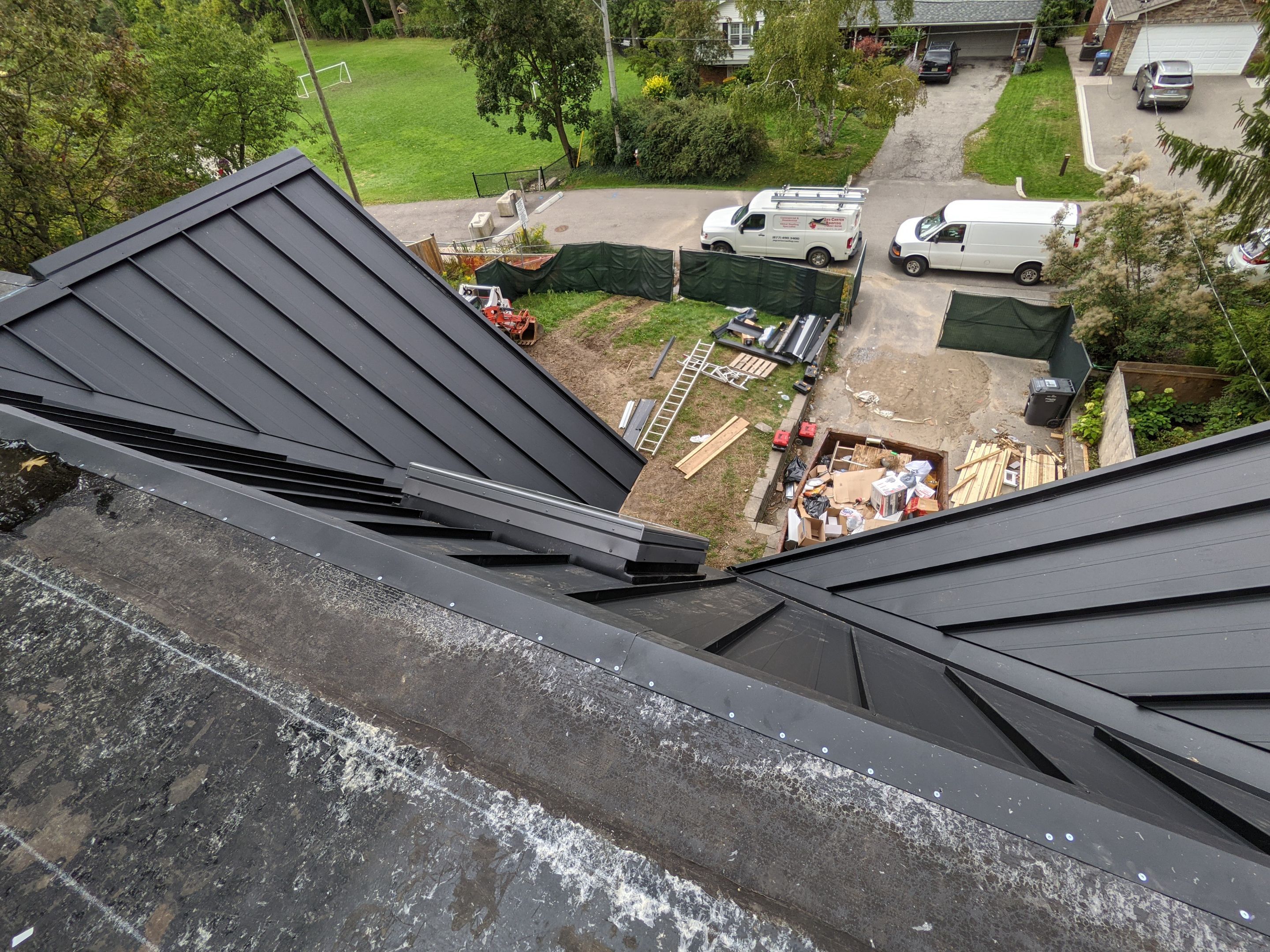 New Roof Installation using 16" Standing Seam Panels by Jay Carter Roofing & Sheet Metal