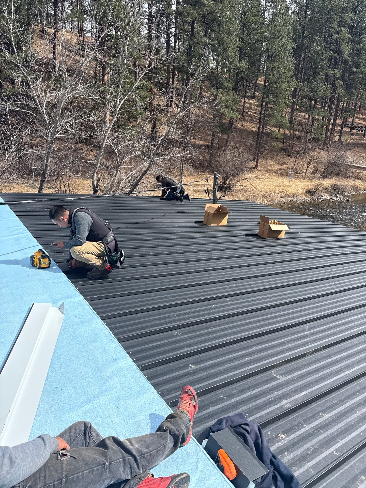 Residential Roofing Installation using Steel Roofing by Weather-Tite Exteriors LLC