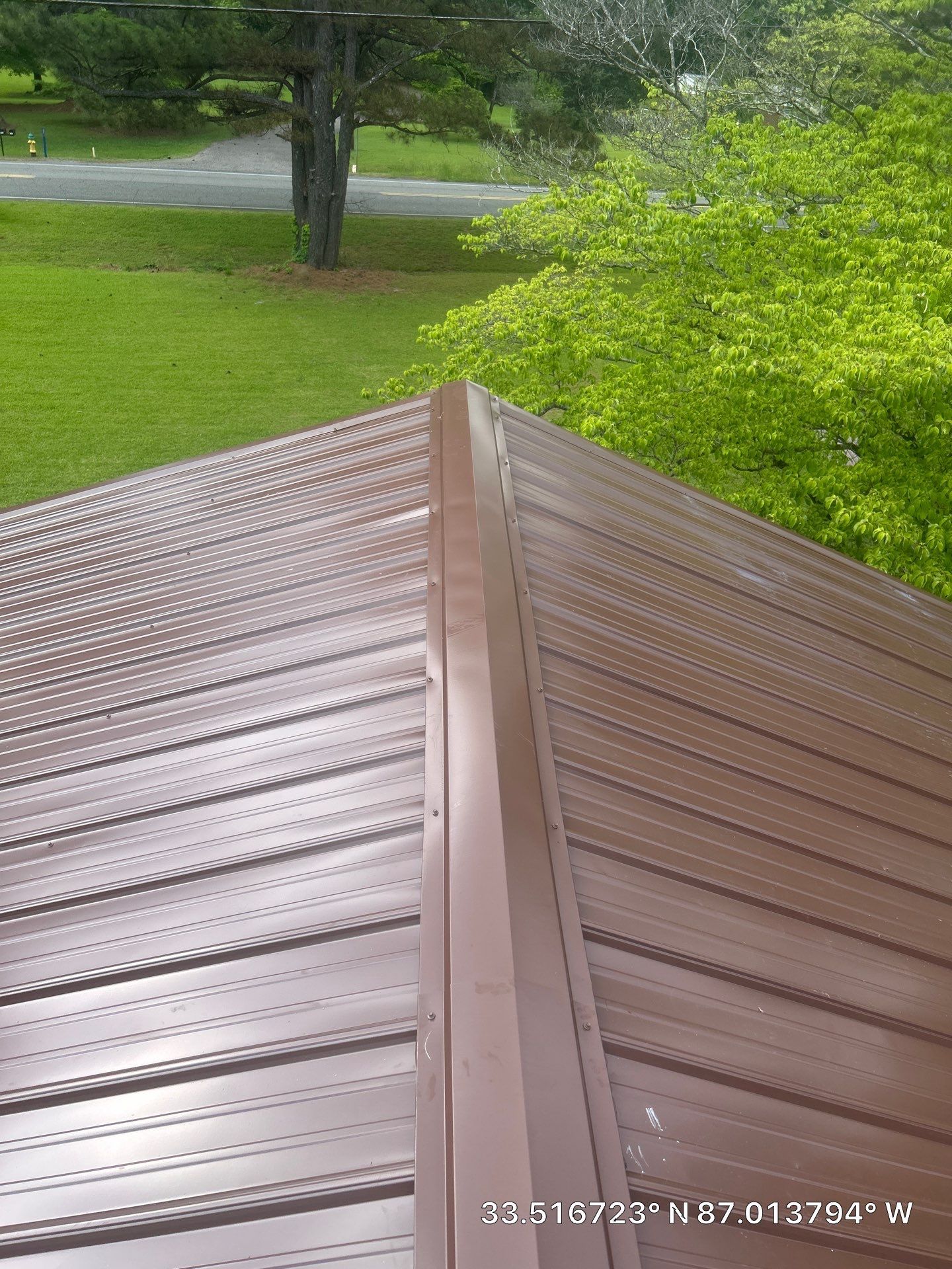 Metal Roof Replacement in Sylvan Springs (Brown) by The Roofing Dudes