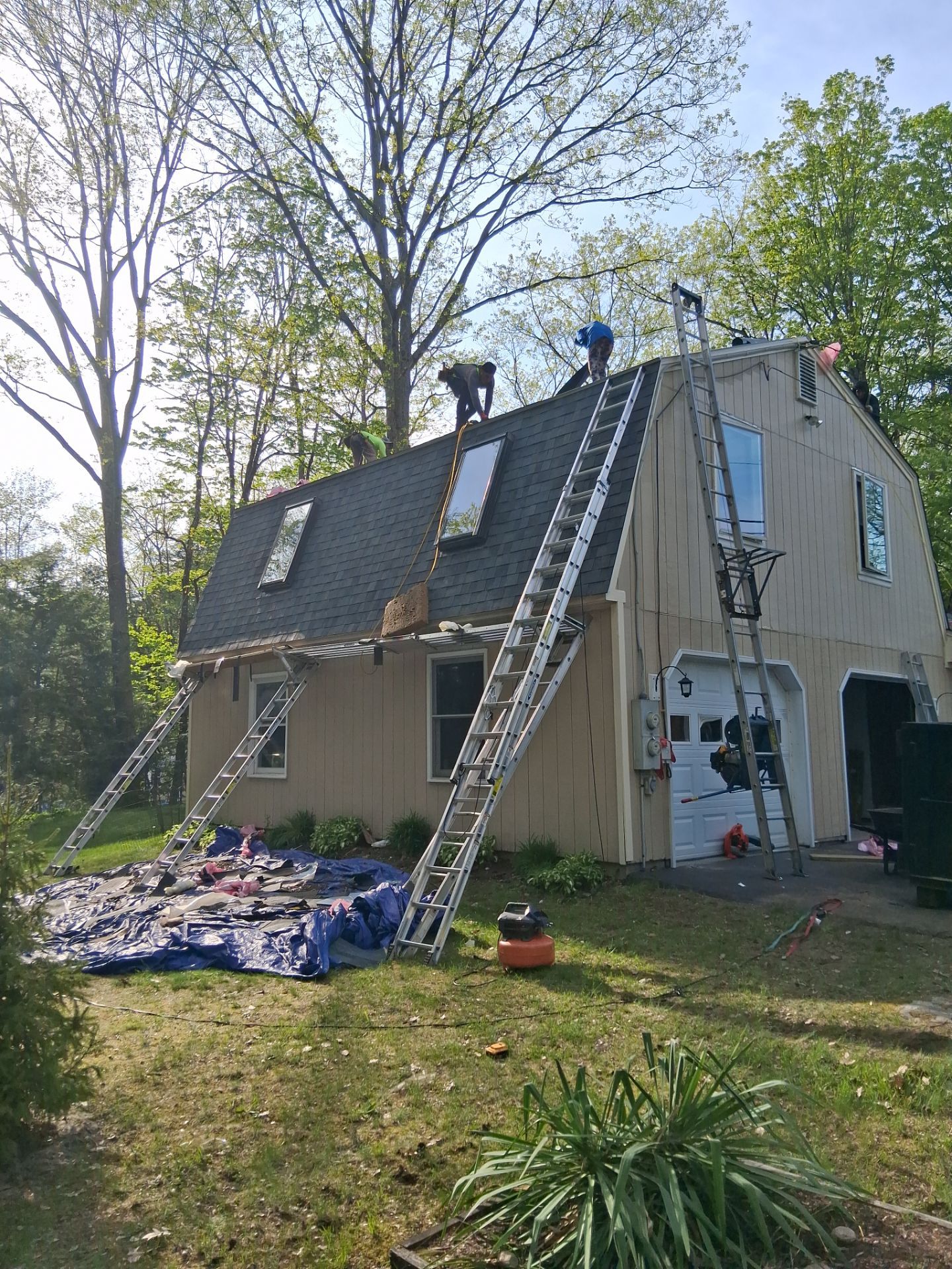 Asphalt Shingle Roof Replacement and Skylight Installation in Newport, NH by Tall pine roofing