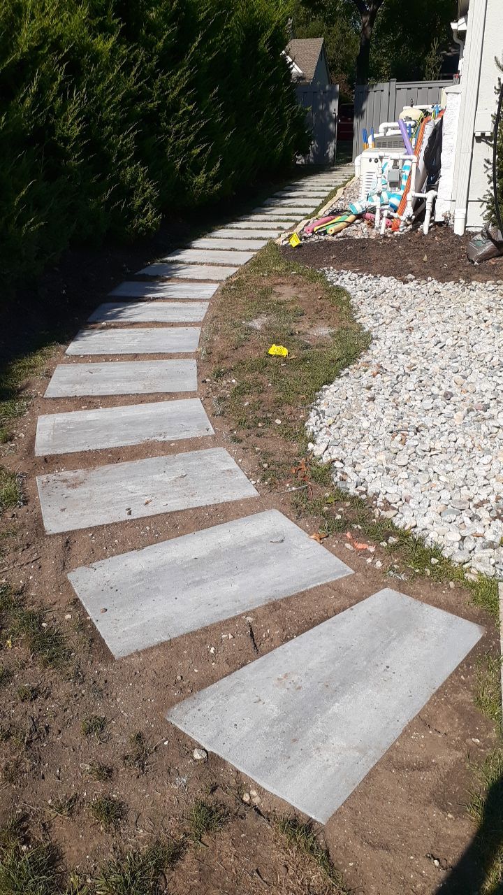 Back Yard Pool Sidewalk and Landscape by LAND ESCAPES LLC