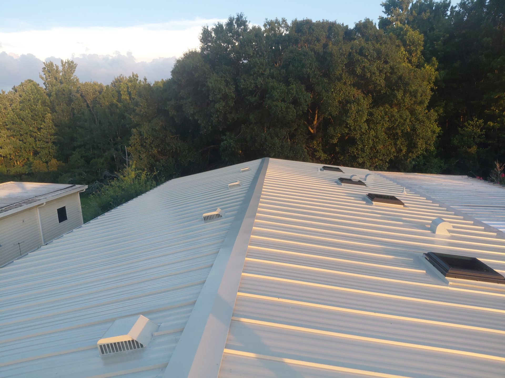 Orlando Residential Standing Seam Metal Roof Installation in Light Stone by Pinnacle Roofing Group