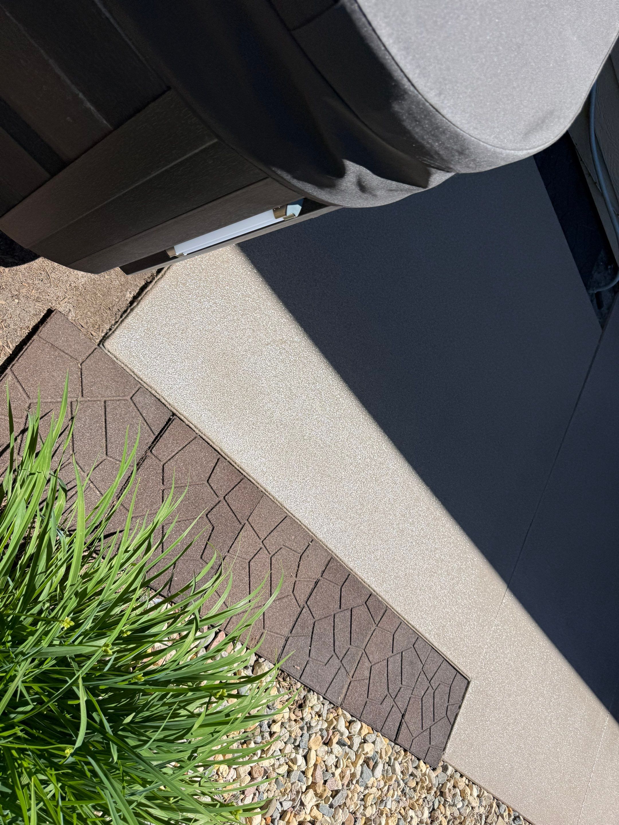 Textured Concrete Coating and Paver Patio Refresh in Sioux Falls by Select Painting, Coatings & Garage Cabinets
