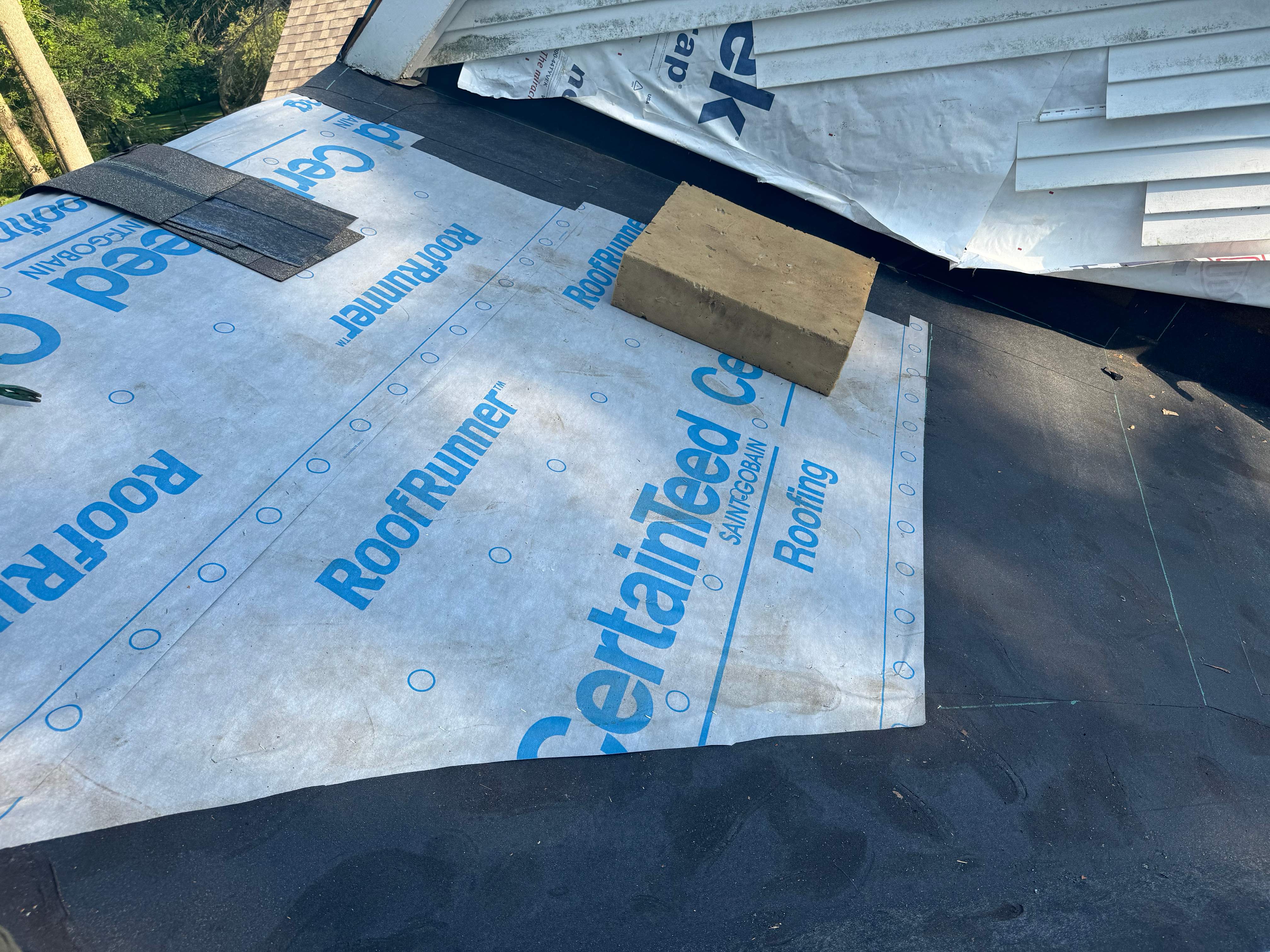Residential Roofing Installation using Certainteed Landmark ClimateFlex by GRACCO