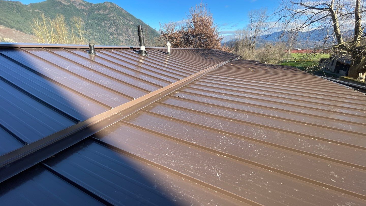 Residential Roofing Installation using 12" Prolok metal  by Top Notch Roofing Inc