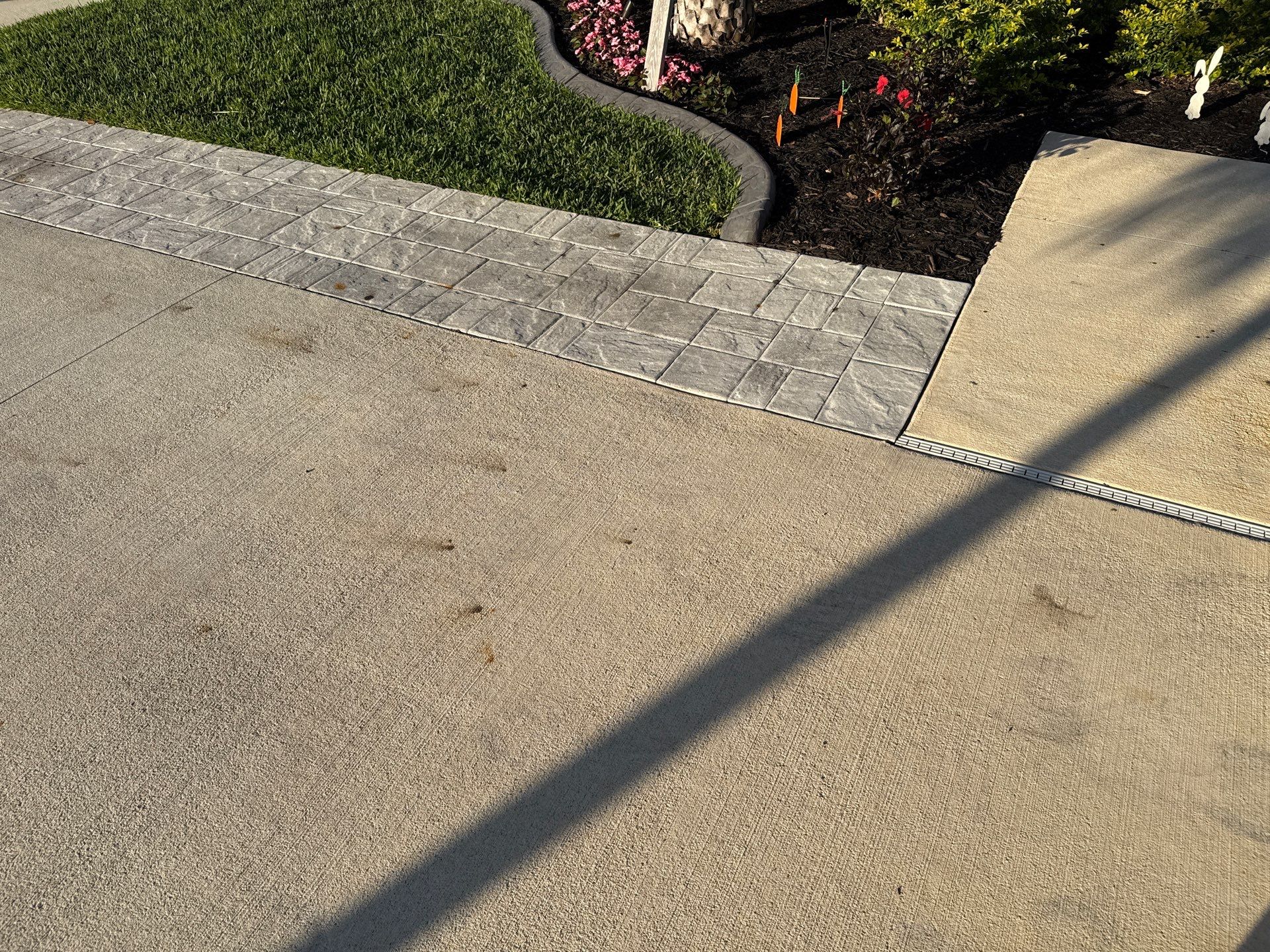Rust Stain Removal from Concrete Driveway and Pavers in Park East at Azario | Lakewood Ranch, FL by Sunshine AquaWash