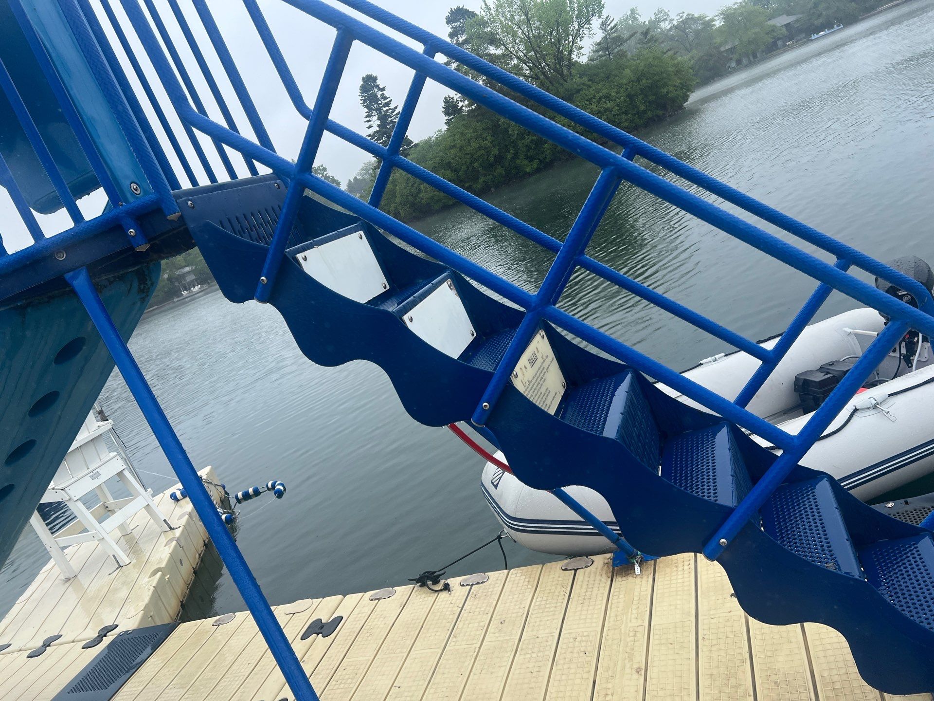 Power washing of floating dock by Northern Power Washing LLC.