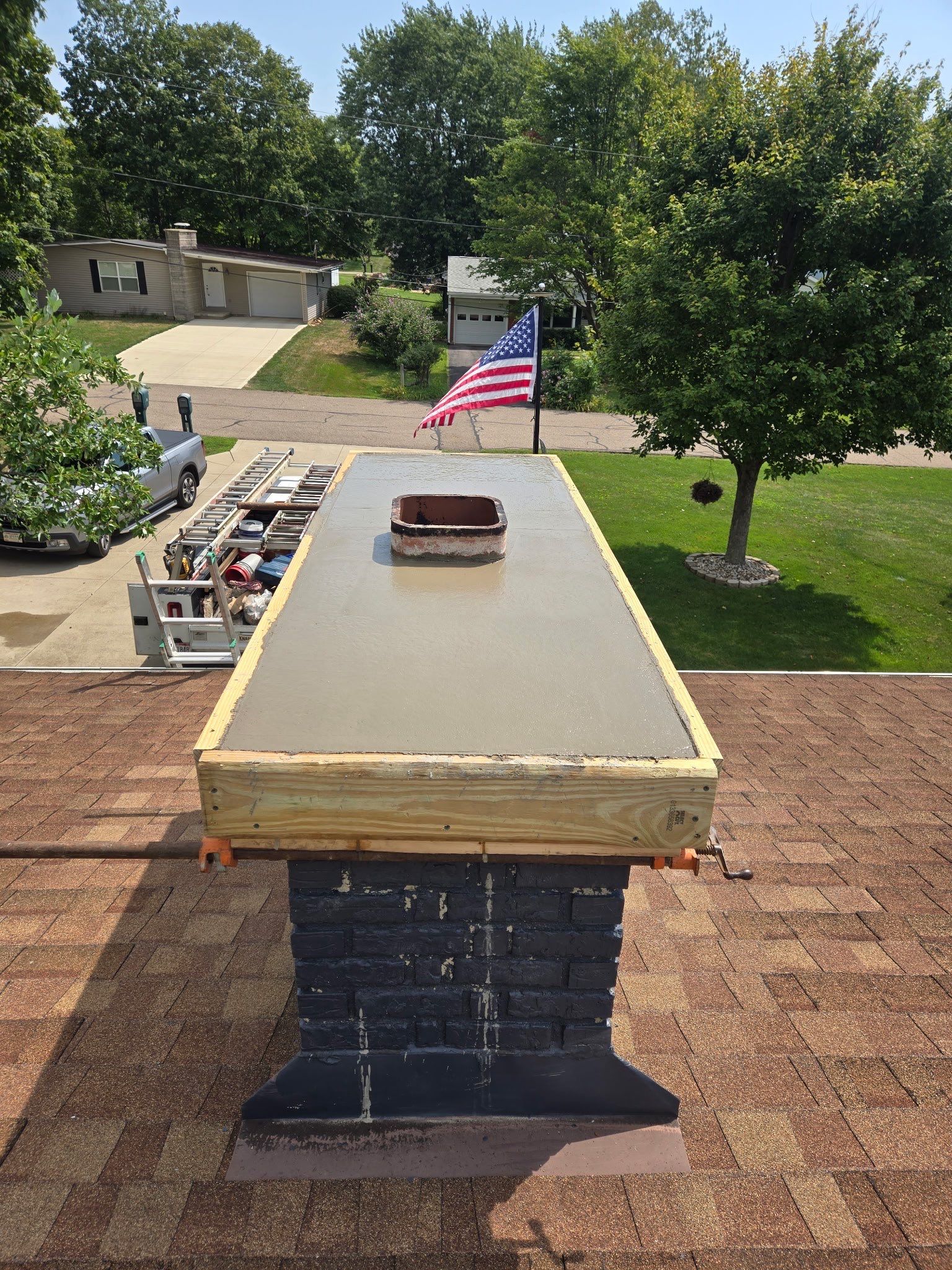 Roof Replacment, Chimney crown  by Know-A-Guy Roofing & Exteriors 