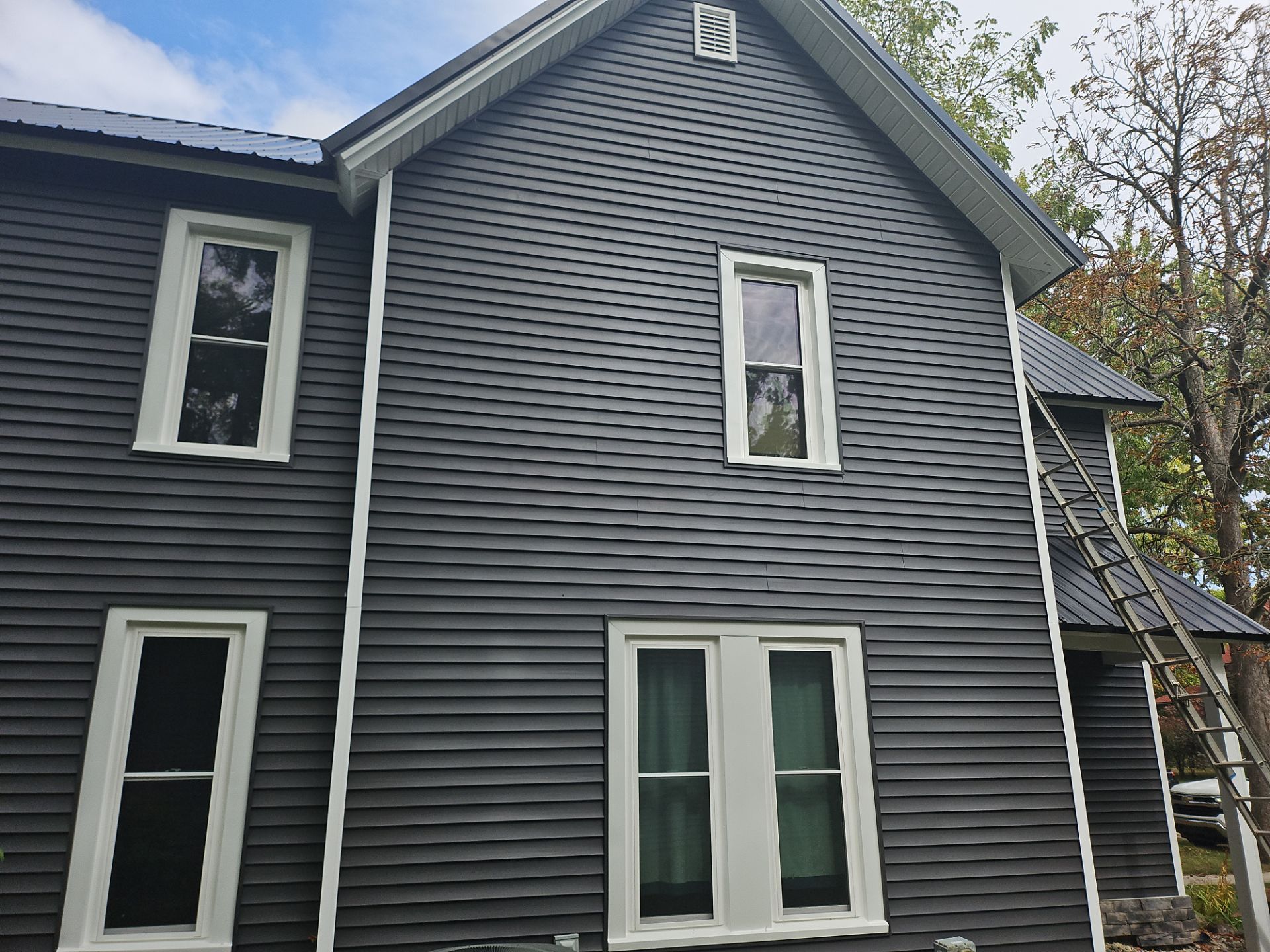 Exterior Makeover using Norandex Siding by Energy Plus Home Improvements