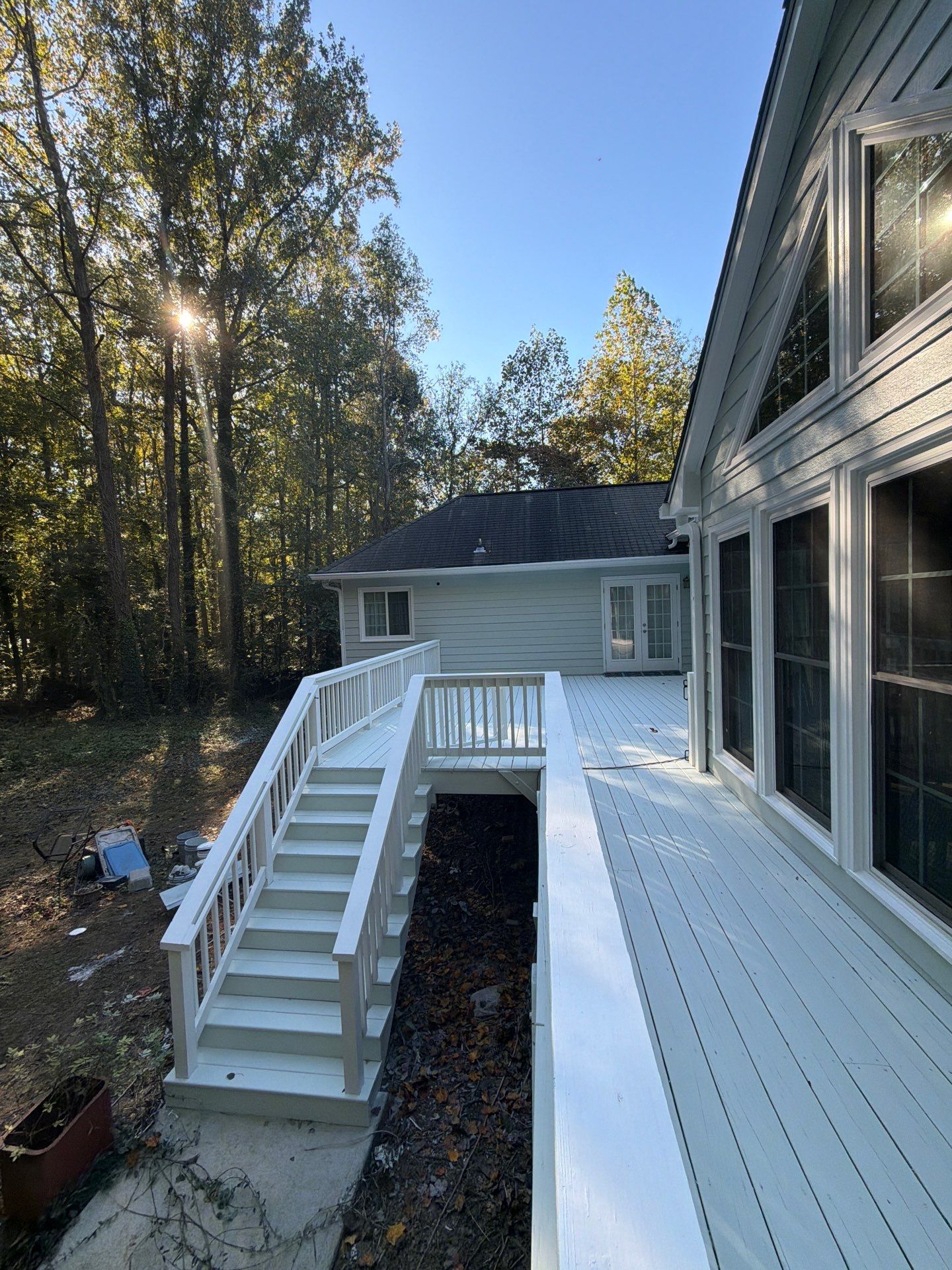 Exterior Residential Painting and Deck Refinishing in Canton, Georgia by Swift Home Renovations 