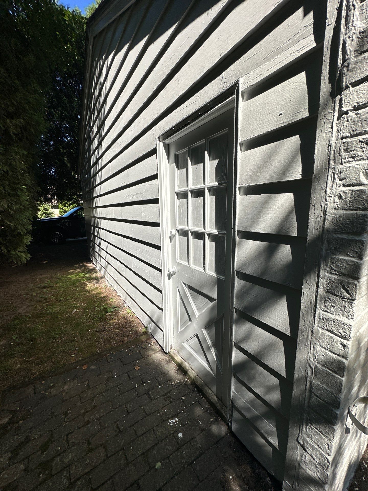 Shorewood Exterior Painting and Siding Refresh With Contrast Trim by OCS Contracting Services