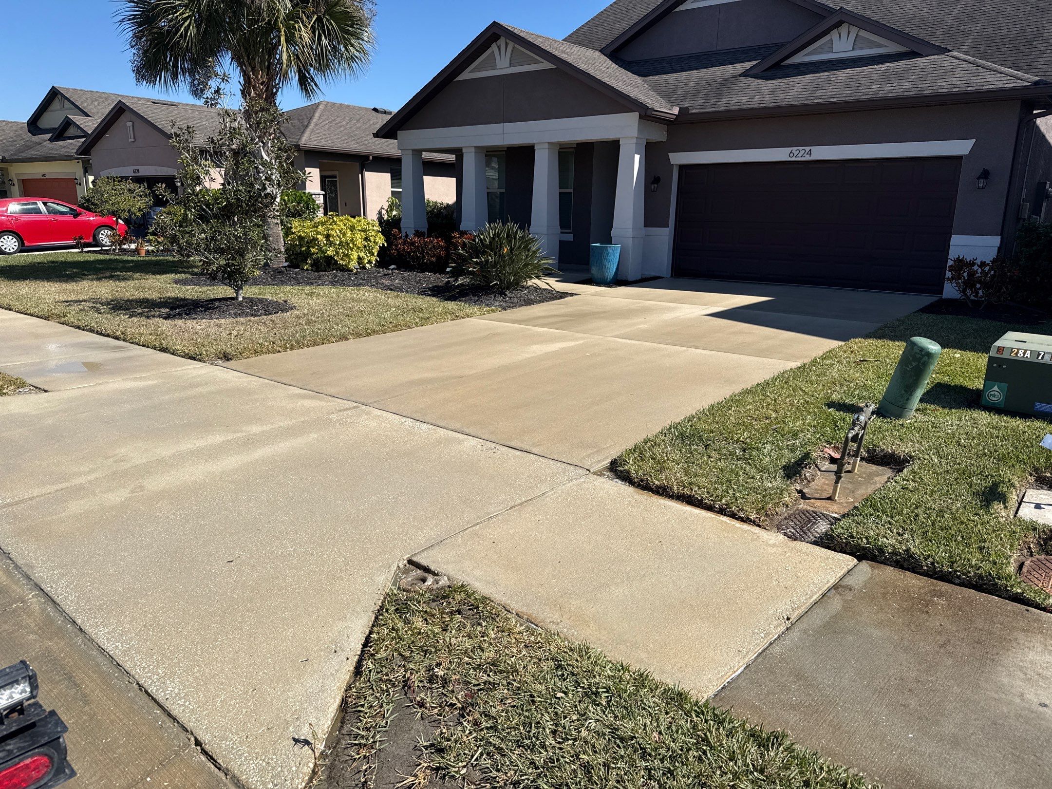 2-Car Concrete Driveway & Sidewalk Cleaning in Trevesta – Palmetto, FL by Sunshine AquaWash