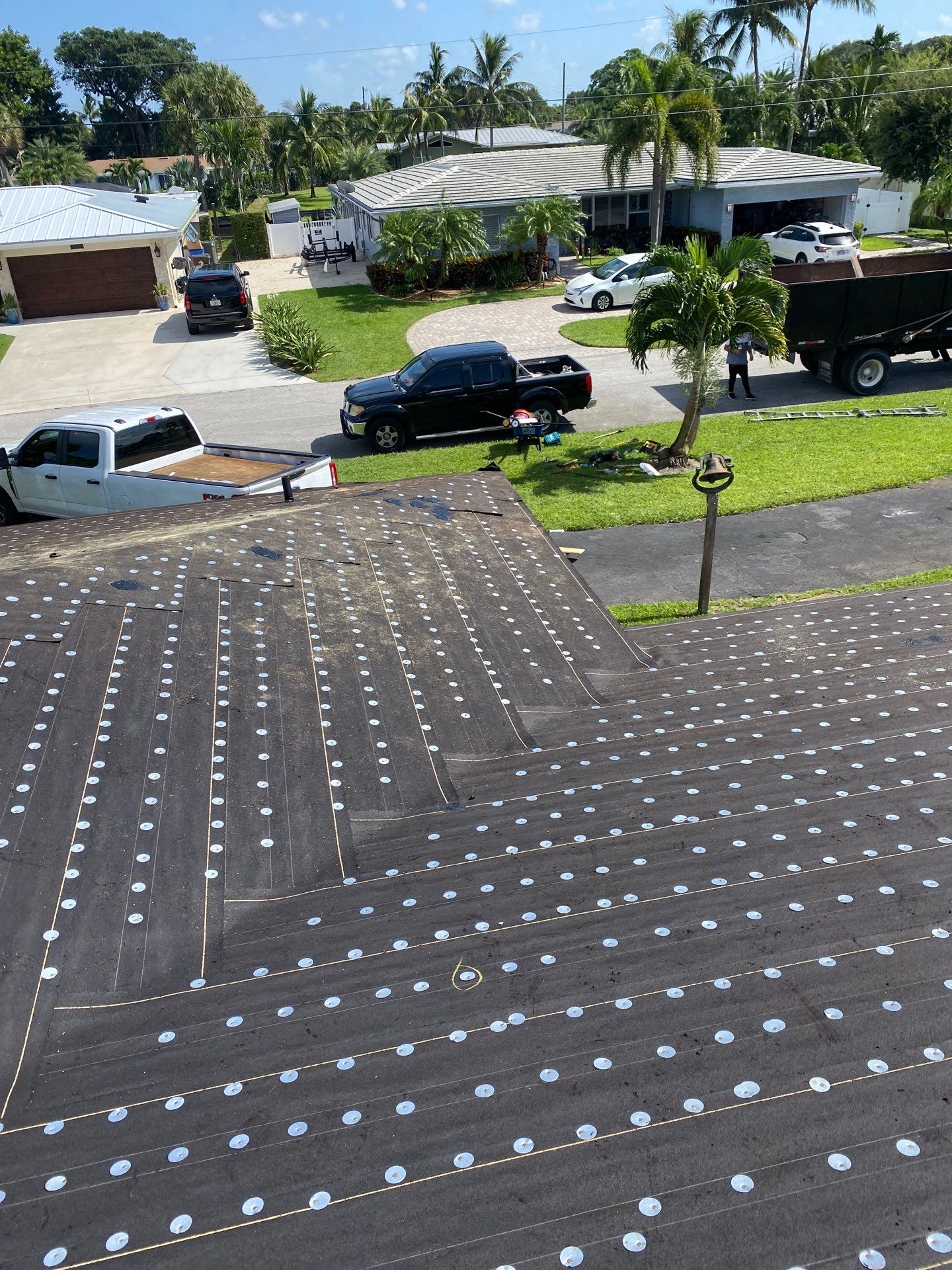 Residential Roofing Installation using 1" Nail strip metal roof by BLUES BROTHERS ROOFING