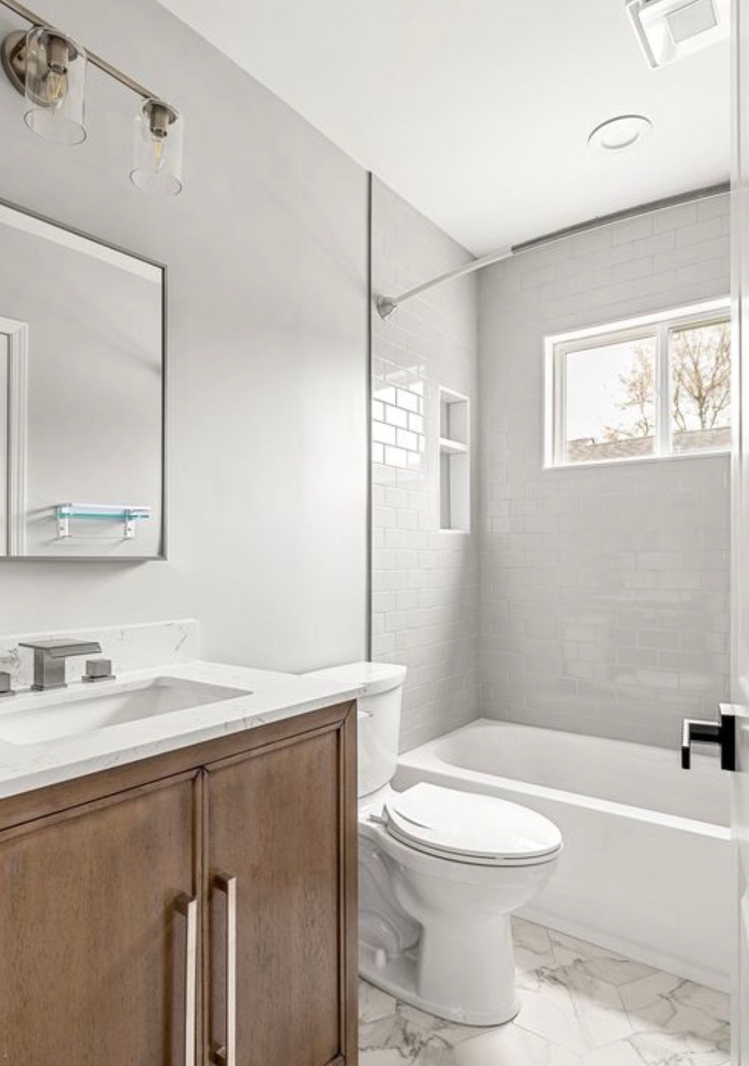 New Construction Bathrooms and Fireplace by Footprints Floors of East Atlanta