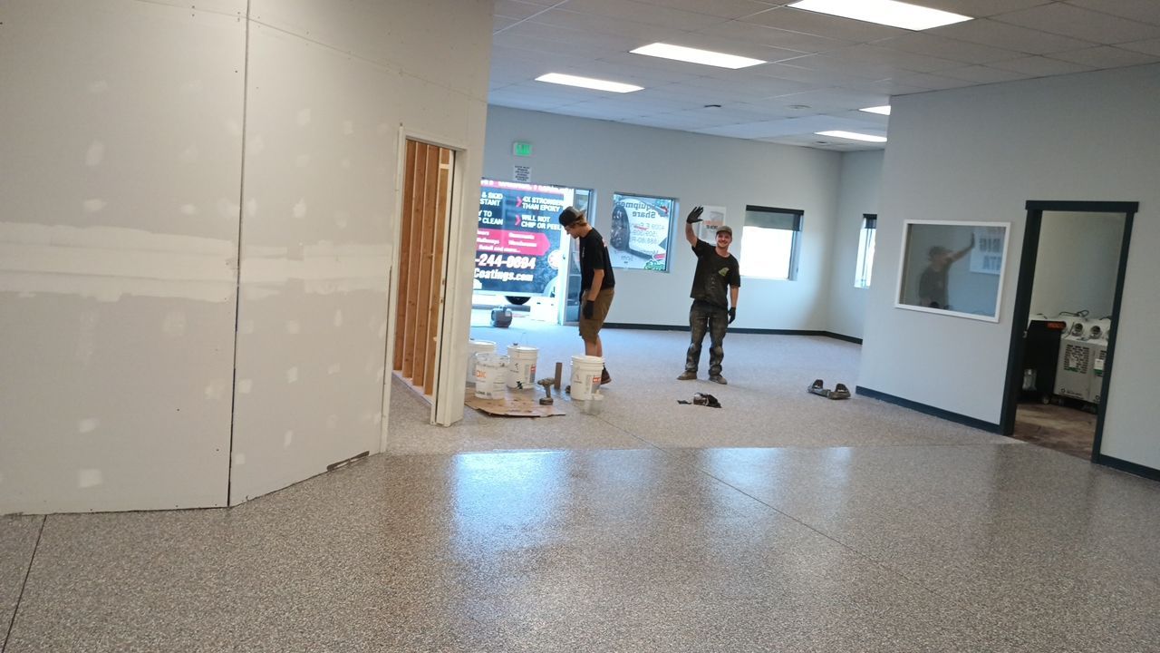 Equipment Share Commercial Floor Transformation using Smoke w/ 5% Orange by Croc Coatings, LLC