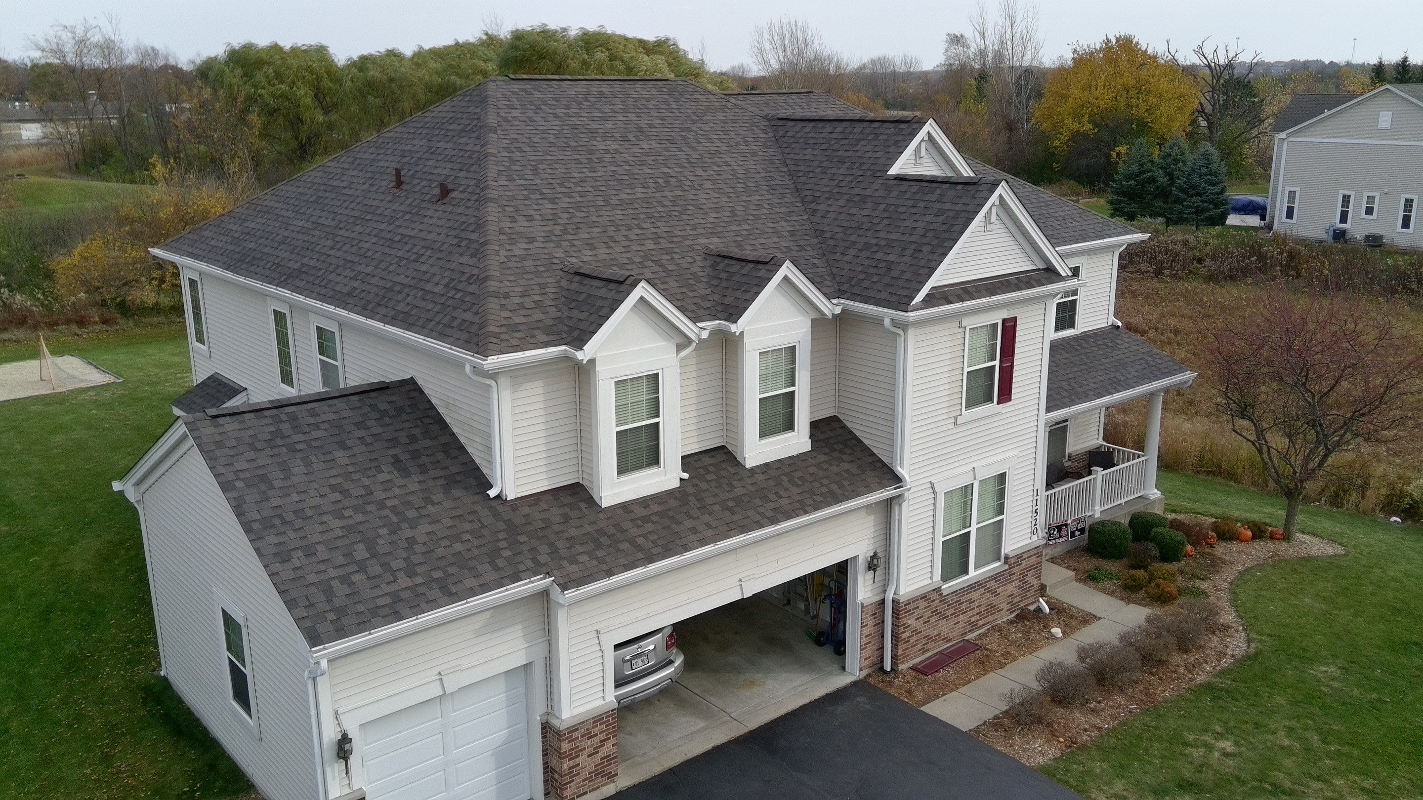 Re-roof: IKO Dynasty in DriftShake by Midwest Building Solutions