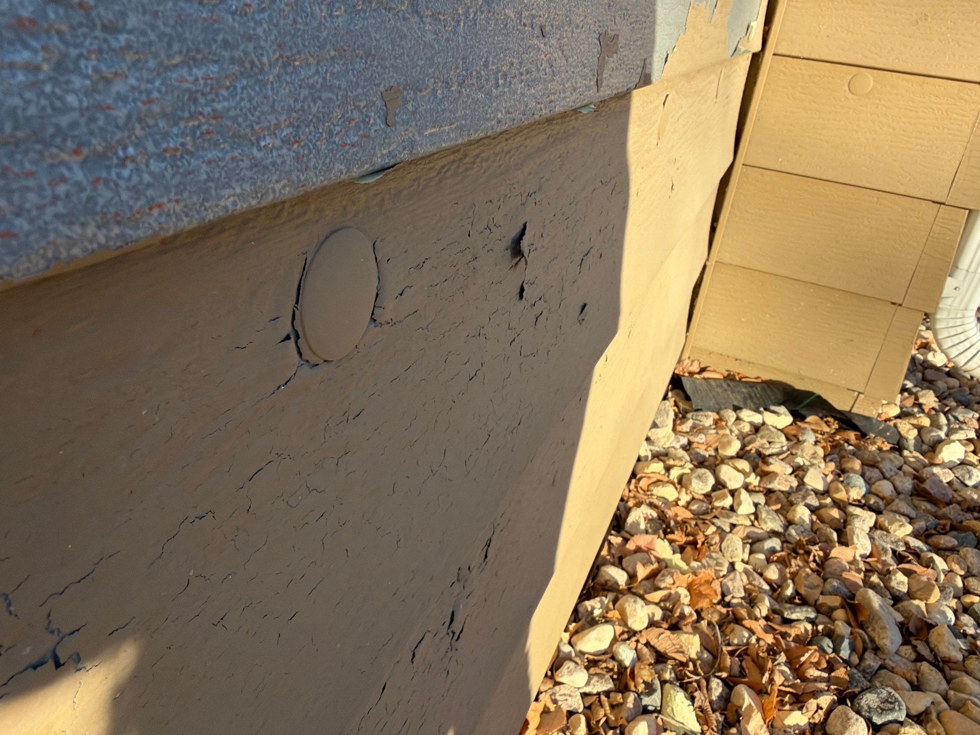 Exterior Siding Repair and Full House Repaint in Sioux Falls by Select Painting, Coatings & Garage Cabinets