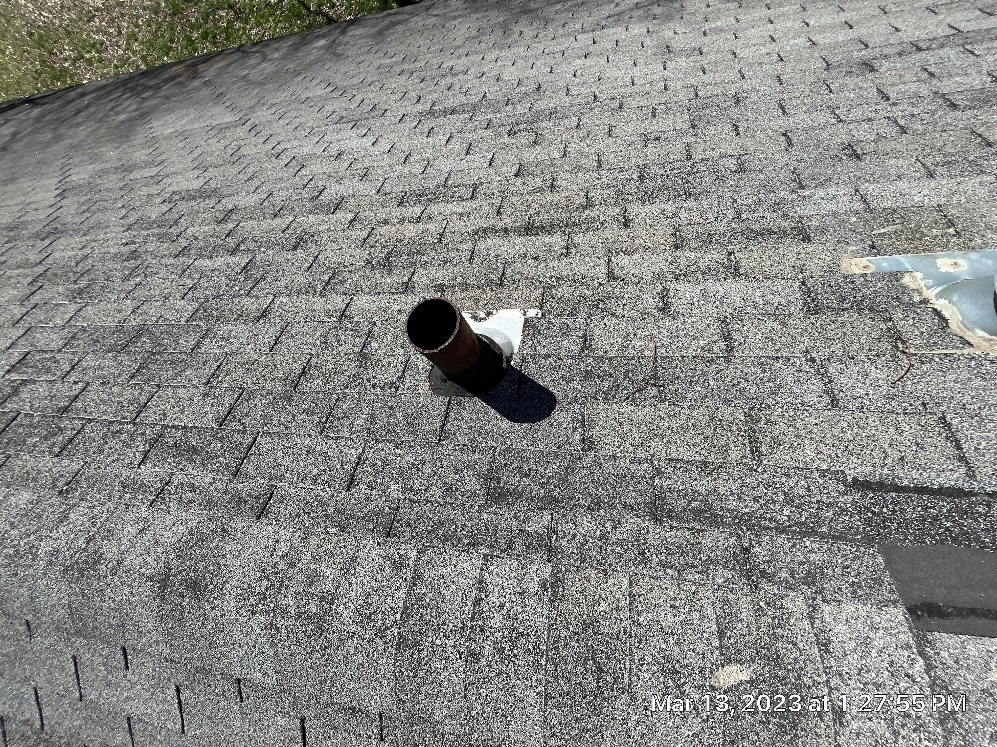 Residential Roofing Installation using 26 Gauge Colored Panels by Hostetler Roofing
