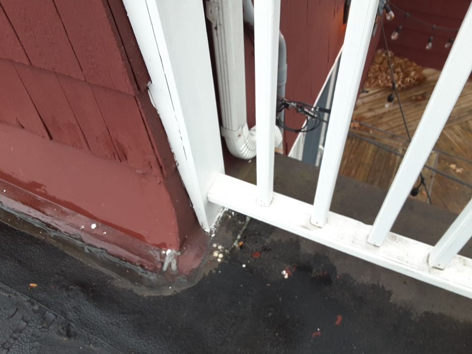 Residential Roof Replacement using Patio Roof by Absolute Roofing and Construction