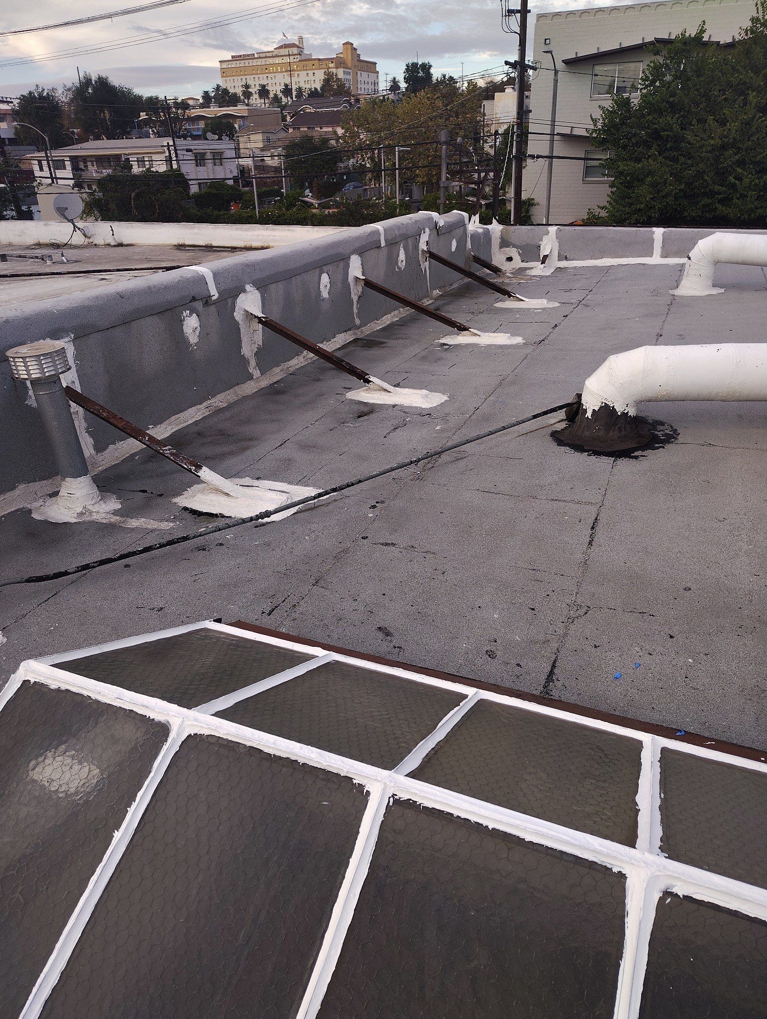 Commercial Roofing Installation using ASC Silicone Membrane by Hull Brothers Roofing