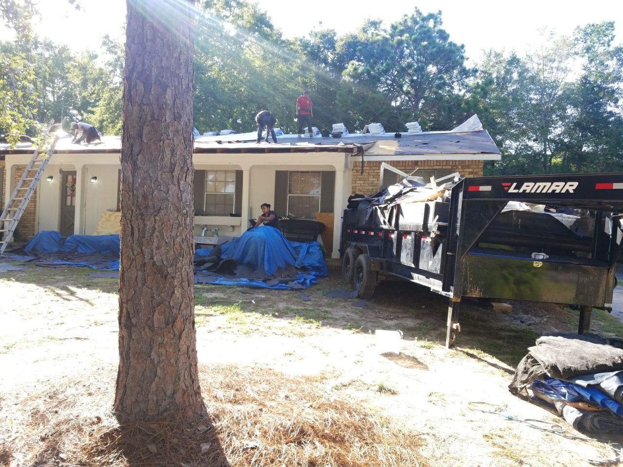 Residential Roofing Installation using Roof Replacement by American Roofing & Construction LLC