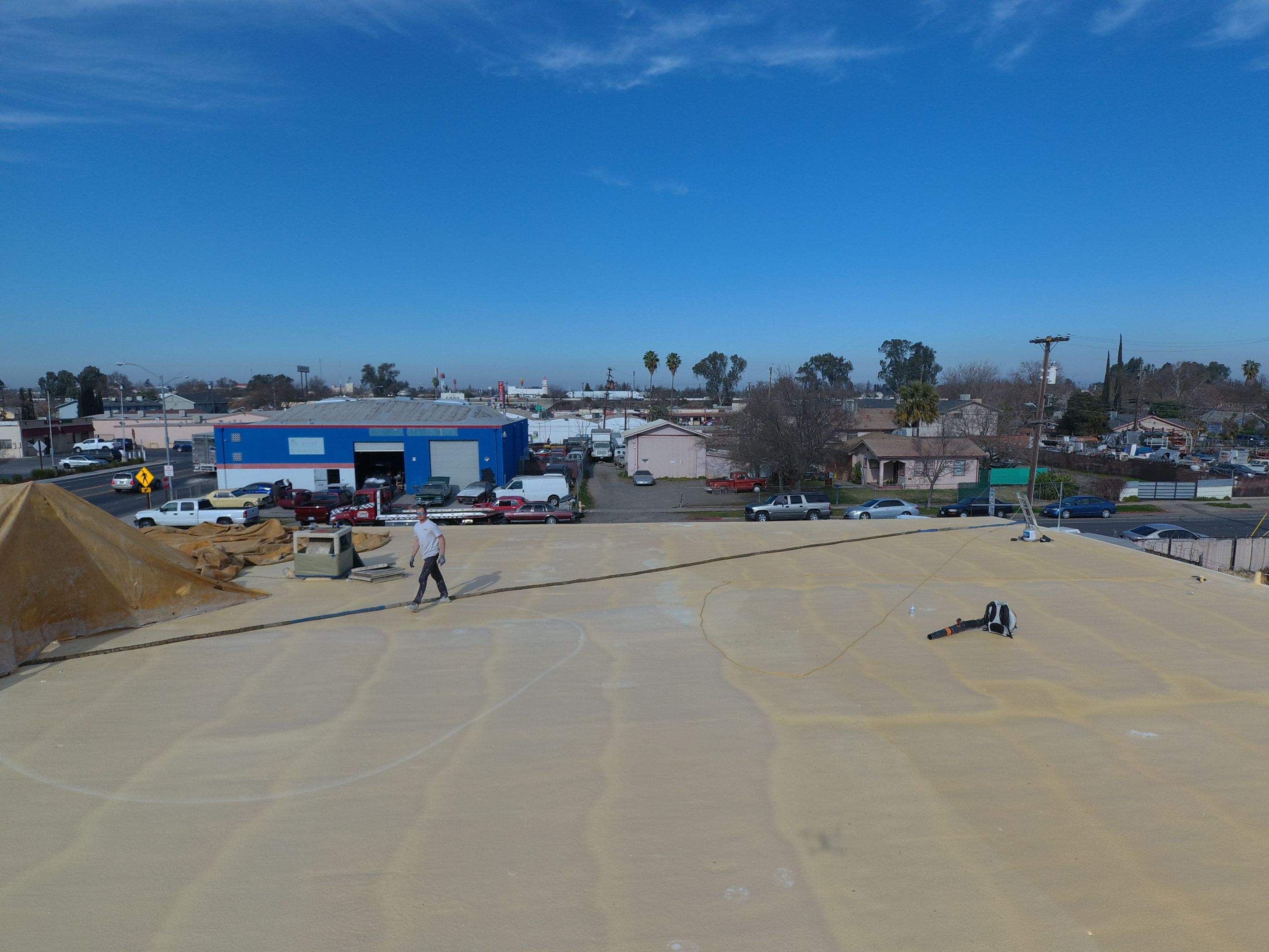 Spray foam and coatings using Conklin Benchmark/PUMA XL coatings and spray foam by Straight Edge Roofing Inc
