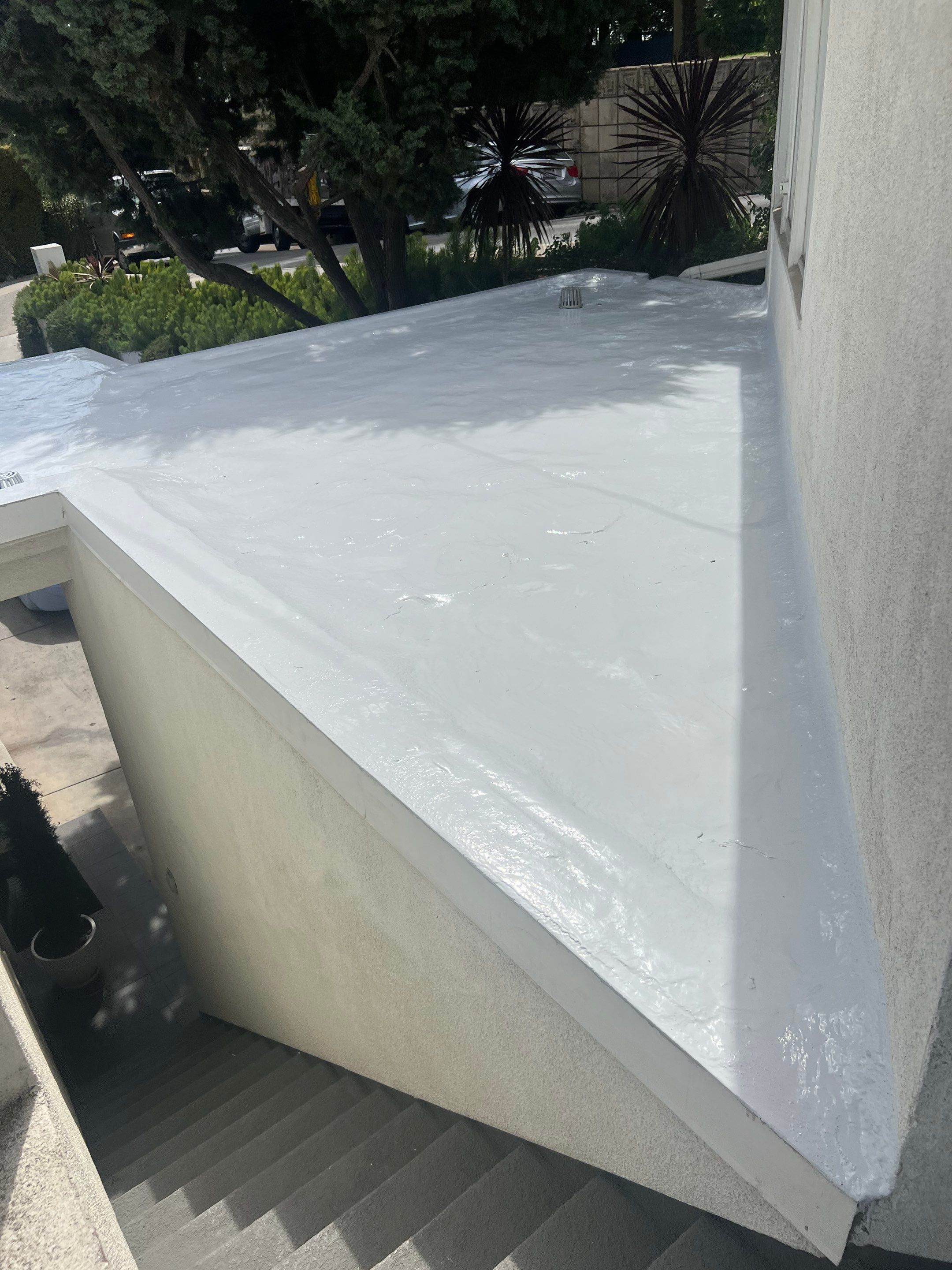 Silicone Membrane Re-coating  by Hull Brothers Roofing