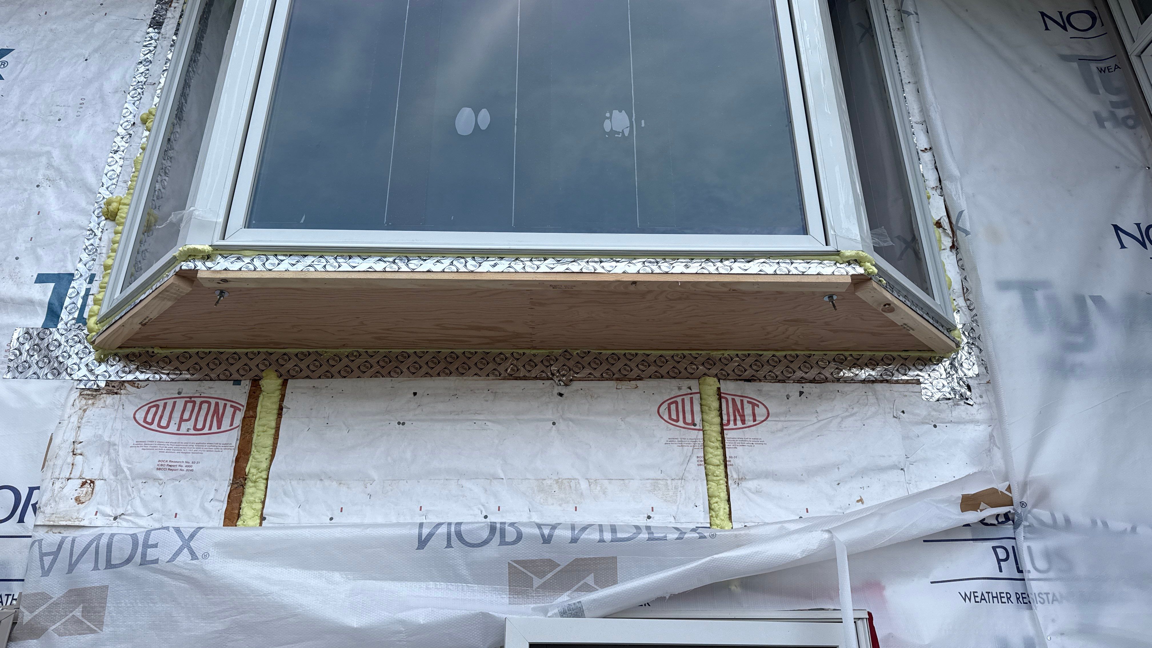 A Clean Window Upgrade Ready for New Siding with Pella Lifestyle Series by United Windows and Siding LLC