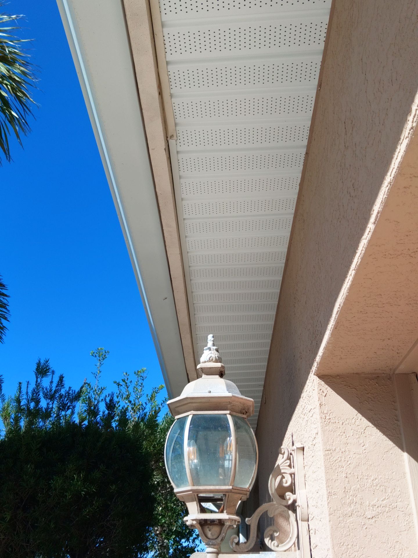 White Soffit and Fascia Installation for Coastal Homes in Sarasota FL by Gutter Professors