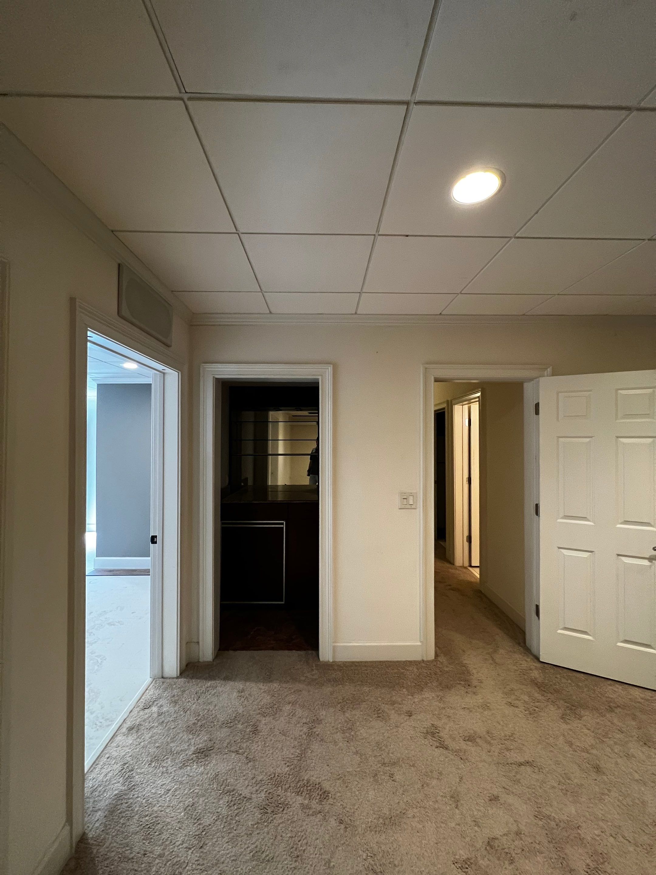 Finished Basement Renovation Featuring Home Theater and Custom Wine Cellar by Swift Home Renovations