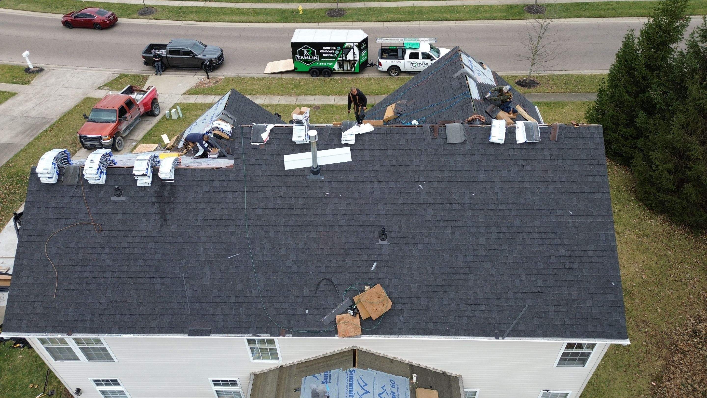 Walden Ponds - Pristine Black and Hydro Flo Gutter Guards by Tamlin Roofing