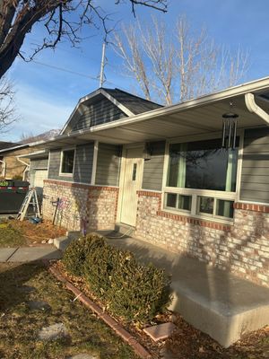Aluminum Siding Replacement with Blue Dutch Lap Vinyl Siding and White Trim