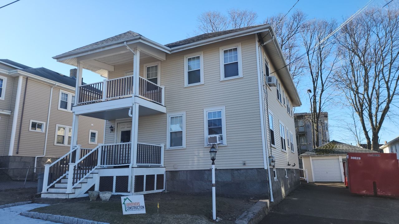 Layover siding project in. Quincy, MA by UBrothers Construction