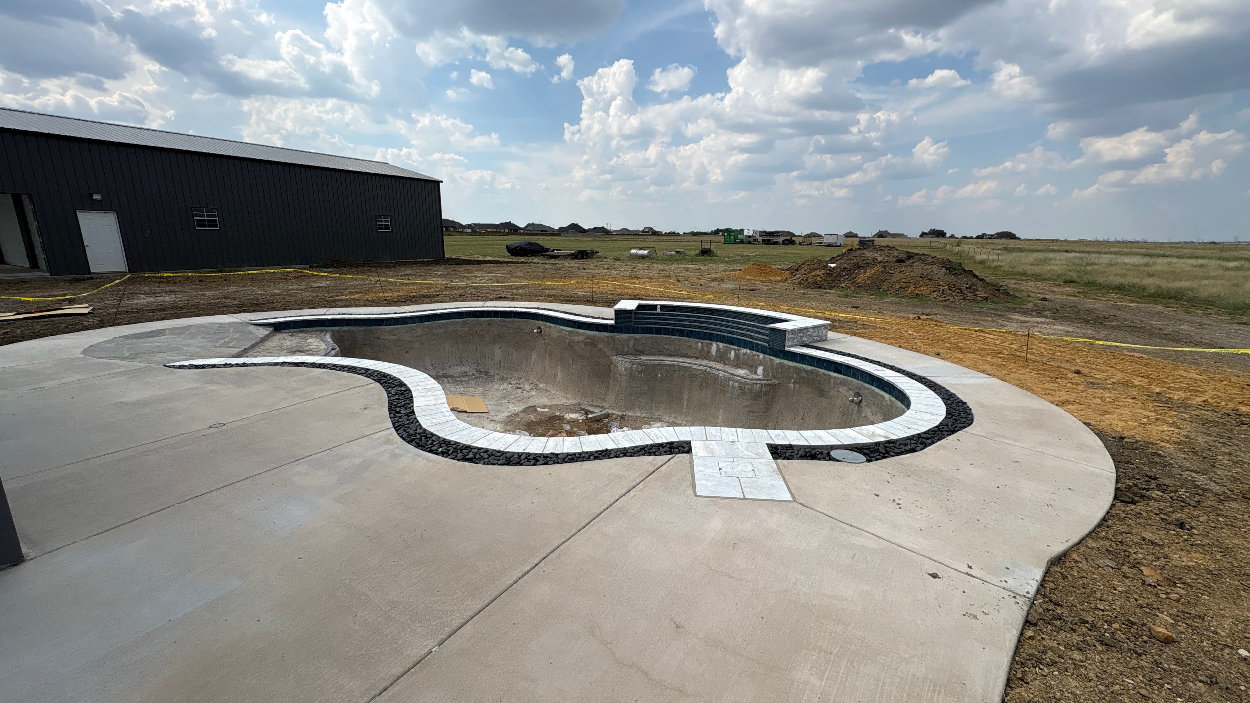 Large Freeform Pool with Beach Entry by Pinnacle Pools and Spas - DFW