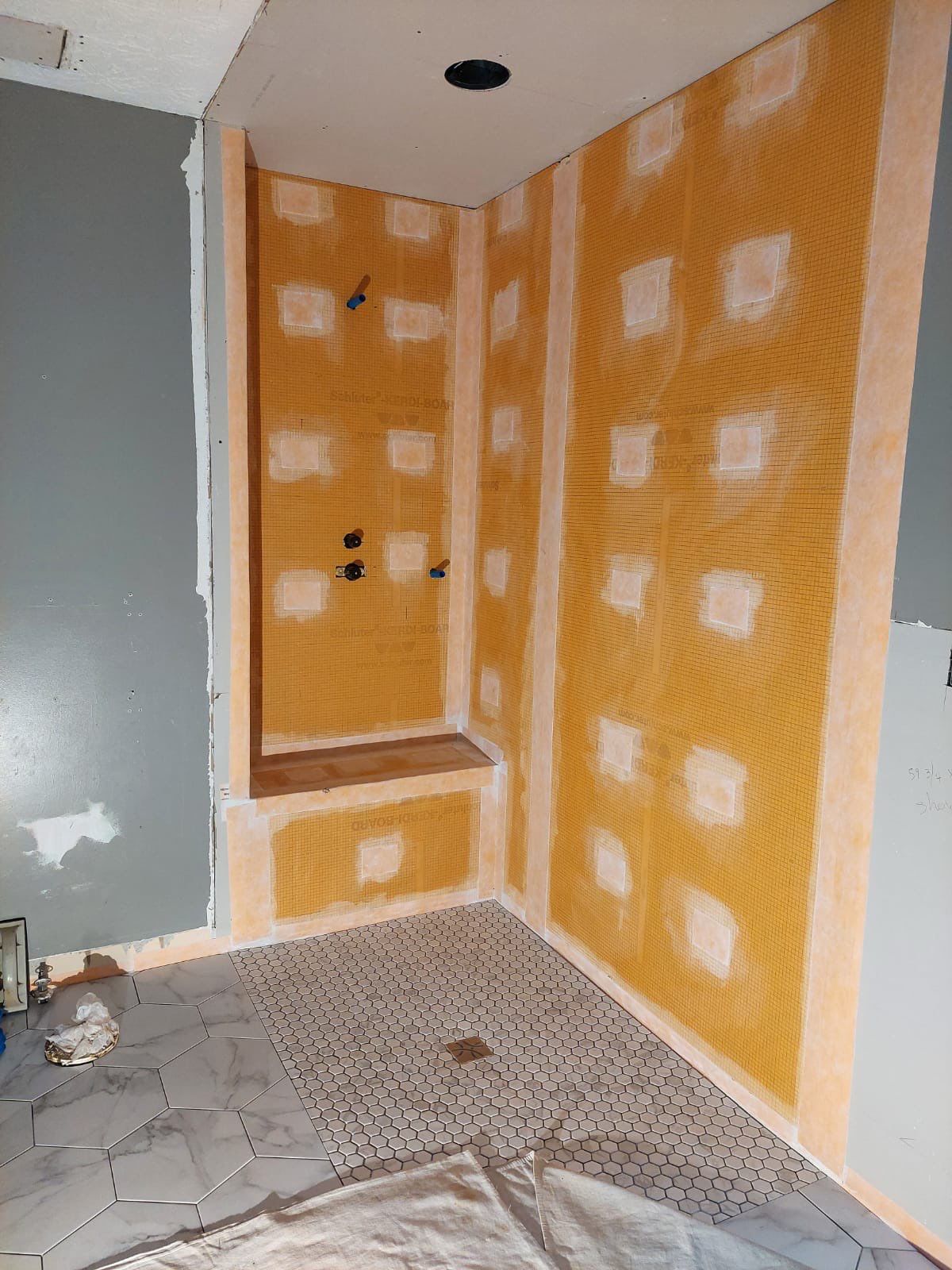 Luxury Bathroom Remodel with Marble Tiles in Kennesaw by Swift Home Renovations 