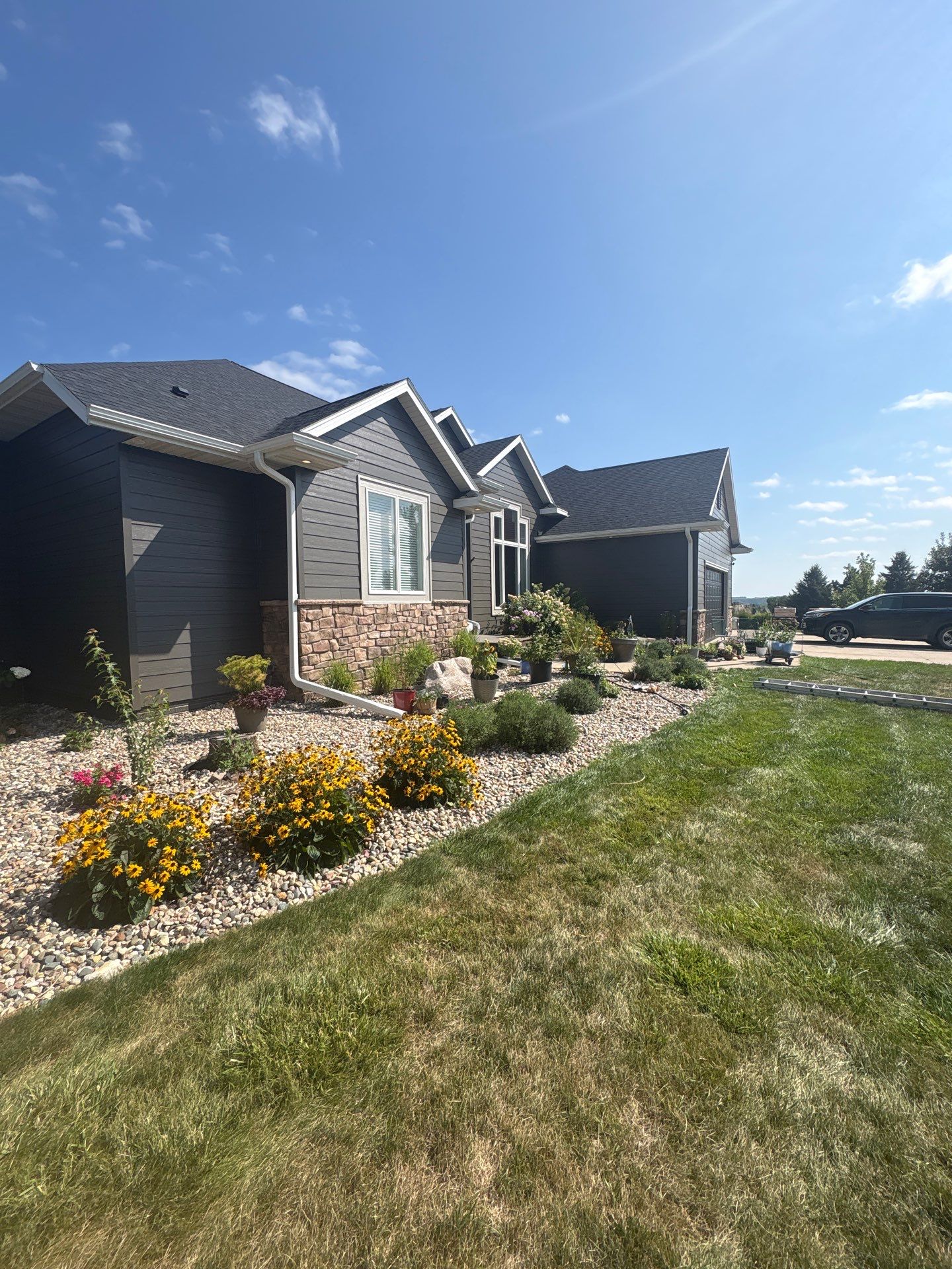 Sioux Falls Residential Exterior Painting and Siding Refresh by Select Painting, Coatings & Garage Cabinets