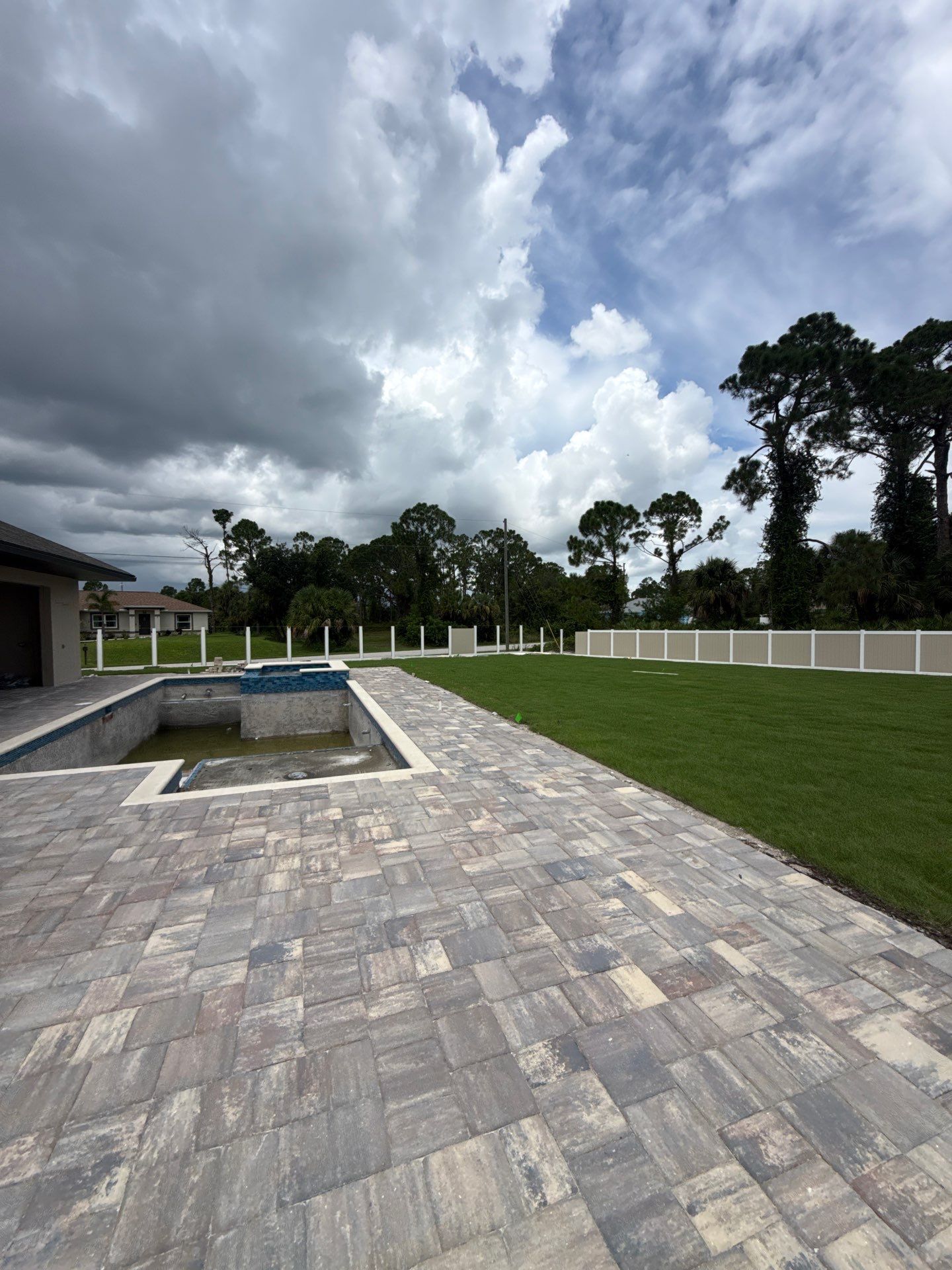 Custom Two-Tone Vinyl Privacy Fence Installation in North Port by True Fence LLC