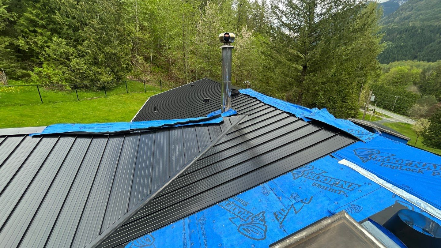 Residential ReRoofing Installation using 12" Prolok metal by Top Notch Roofing Inc